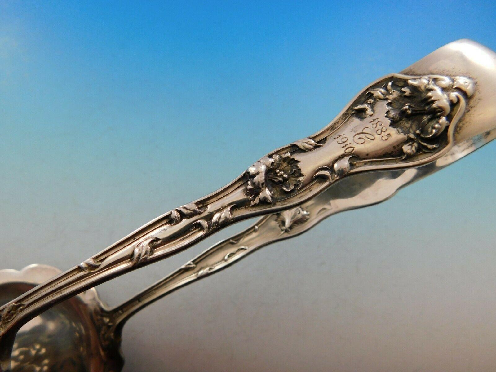 Intaglio de Reed & Barton

Magnifique pince à asperges en argent sterling mesurant 9