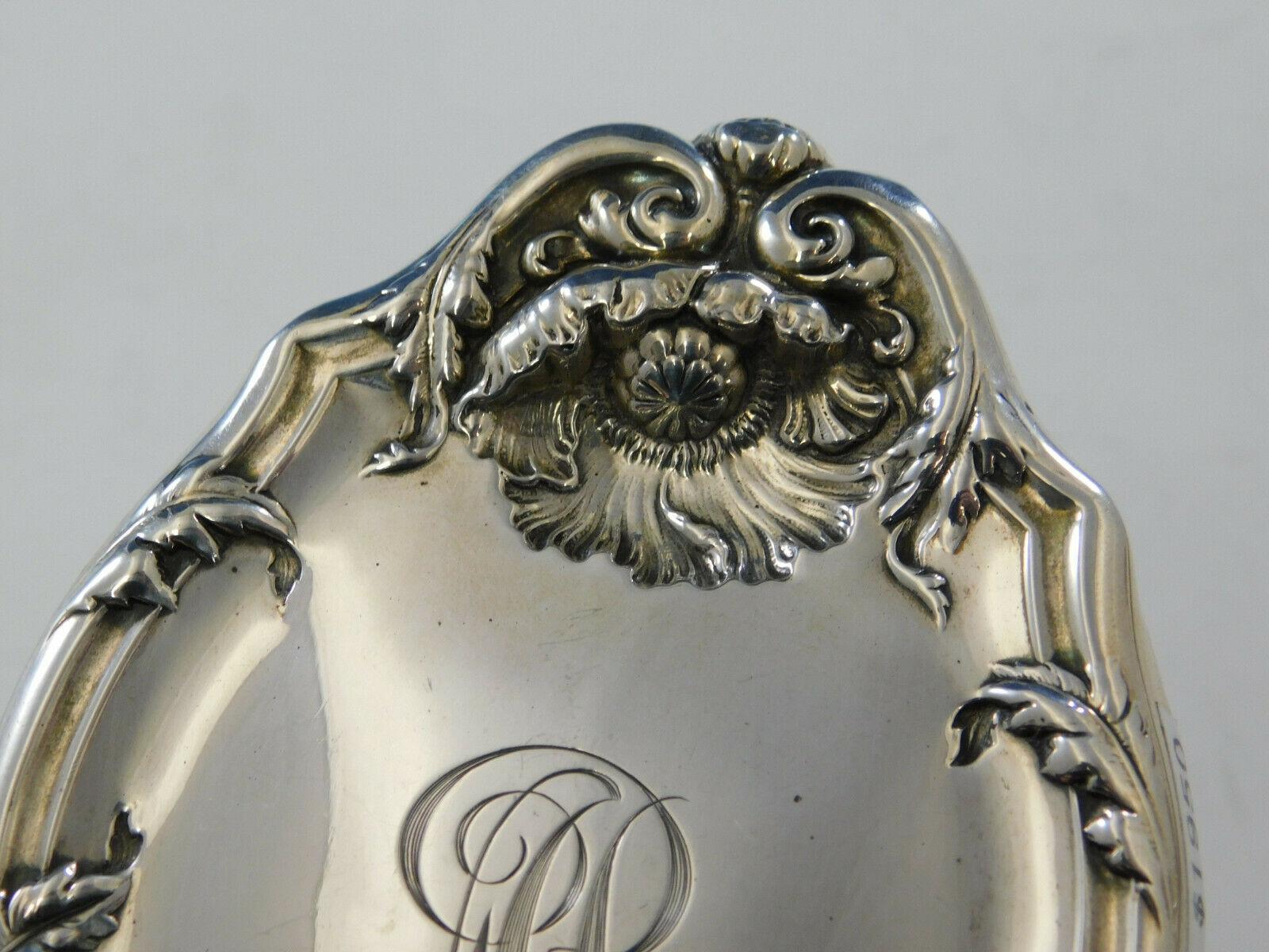 Intaglio by Reed & Barton
Sterling silver Art Nouveau 11-piece dresser set in the pattern intaglio by Reed & Barton. It is monogrammed with script 