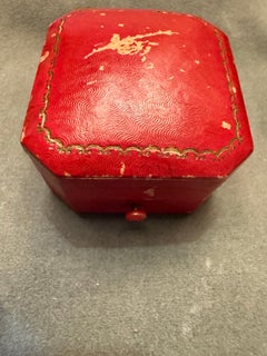 Intense and brilliant three stone tsavorite stones in gold setting.