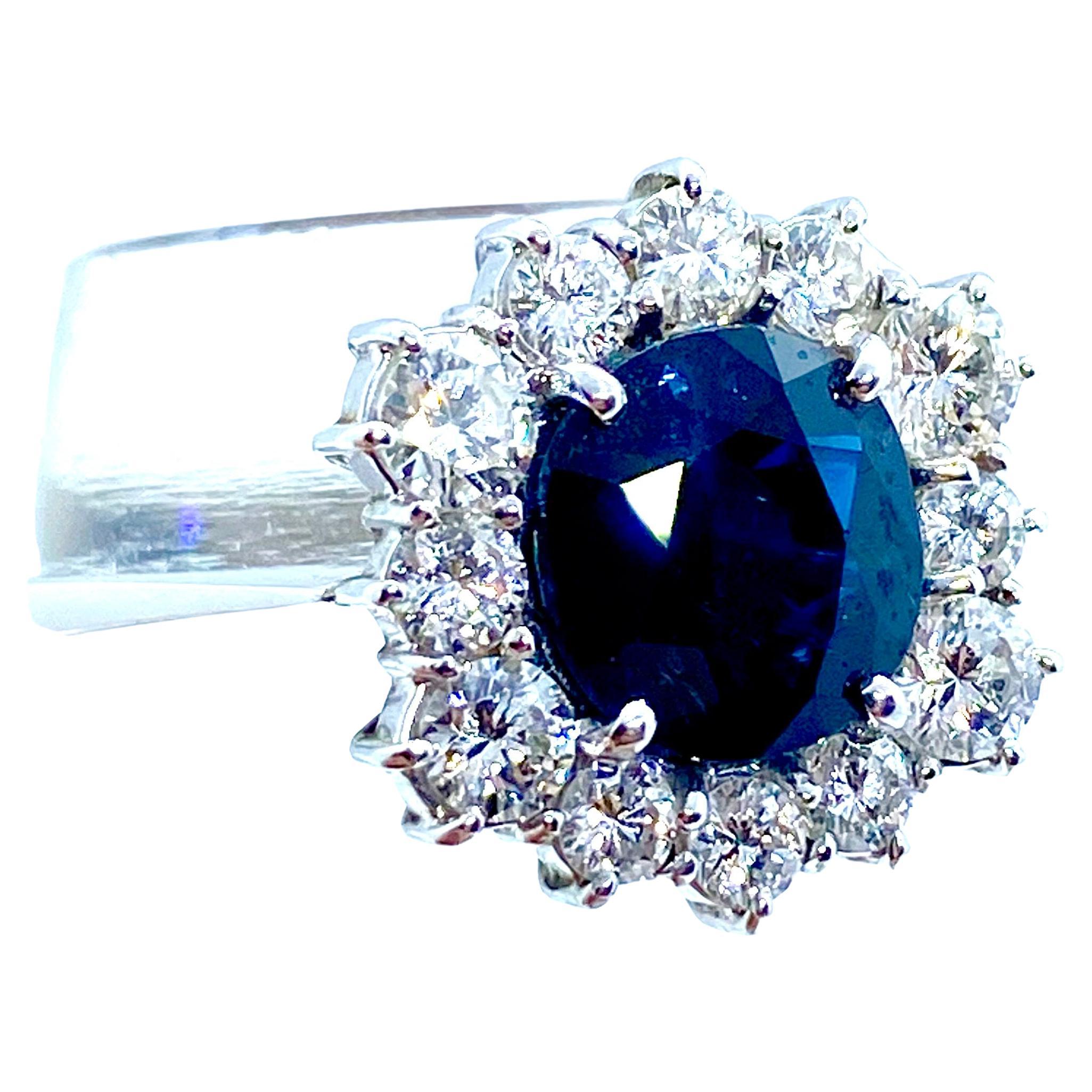 Intense Blue Sapphire and Diamonds Ring For Sale