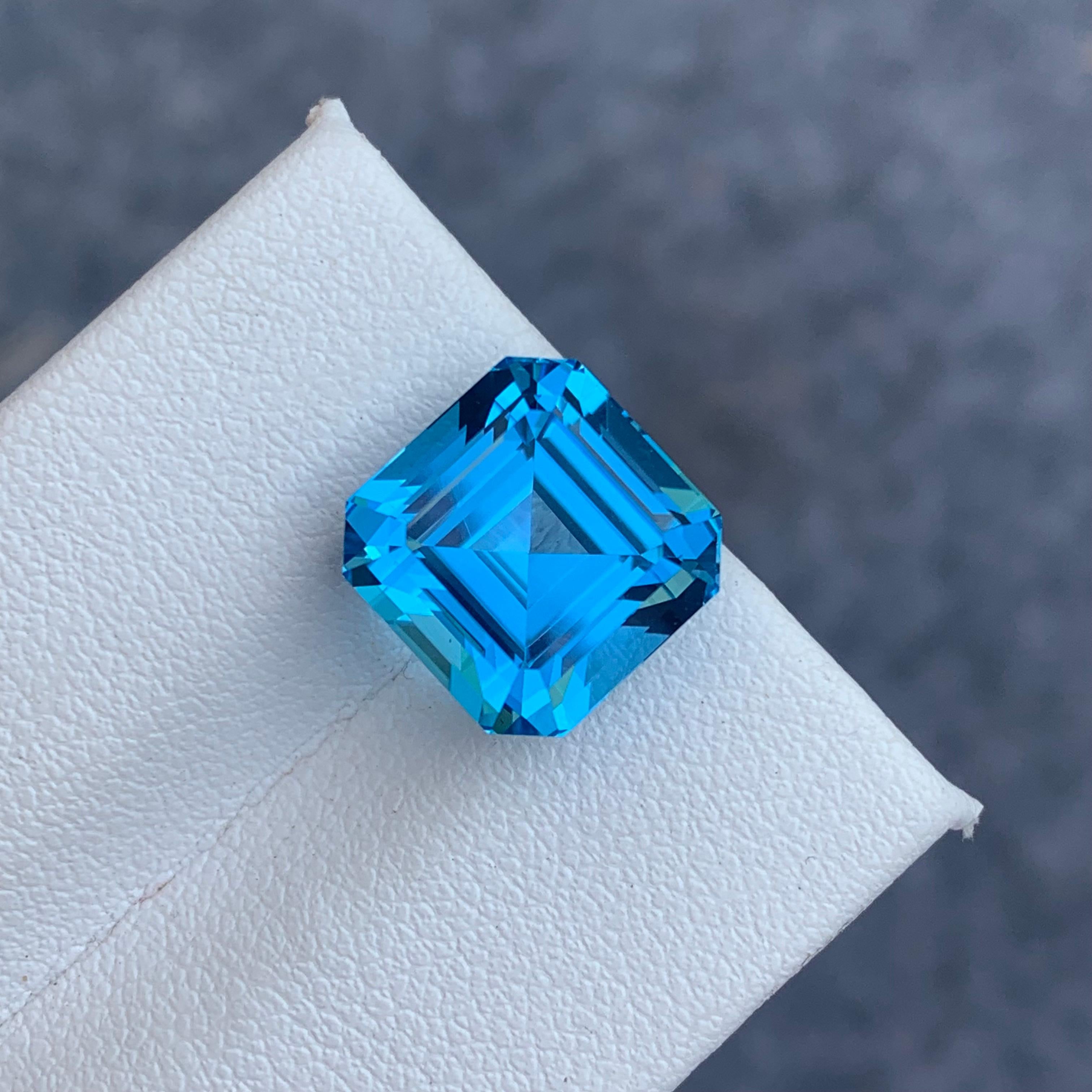 Arts and Crafts Intense Color 9.55 Carat Loose Electric Blue Topaz Asscher Cut Gemstone  For Sale
