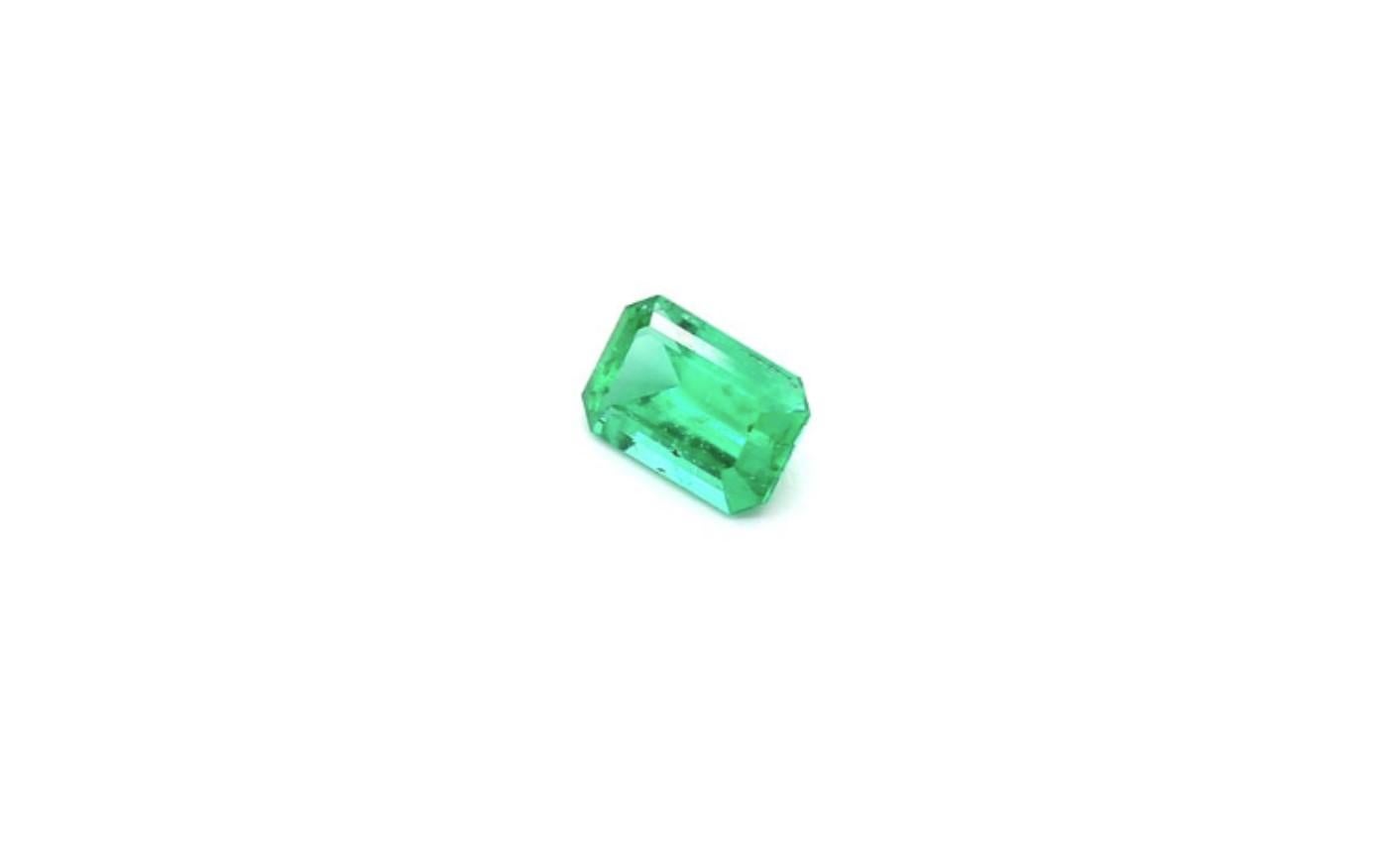 Octagon Cut Intense Green Emerald Cut Emerald Ring Gem 0.54 Carat Weight For Sale