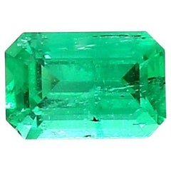 Used Intense Green Emerald Cut Emerald Ring Gem 0.54 Carat Weight