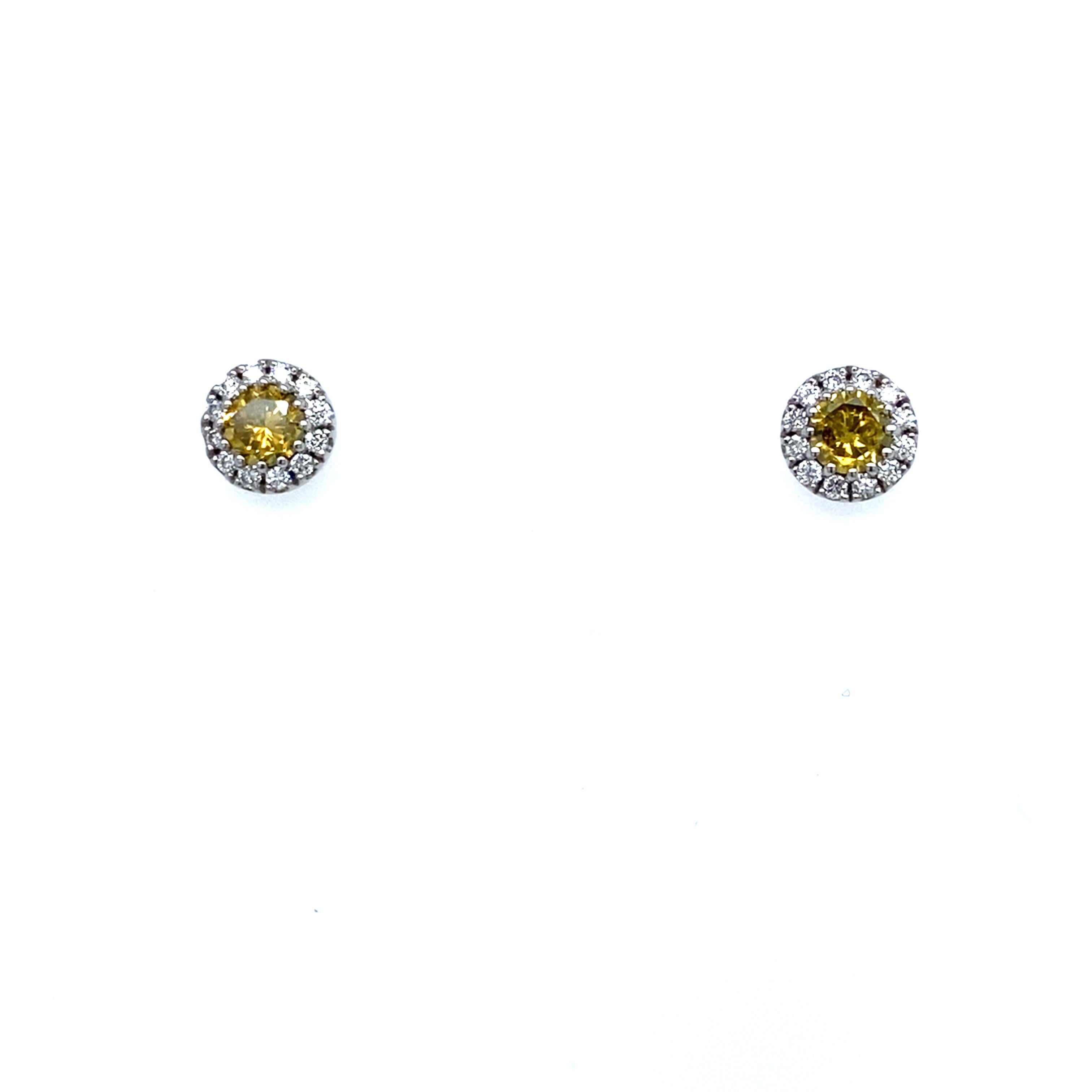 Round Cut Intense Yellow Diamond Earrings Surrounded by 0.16ct G/VS White Diamonds For Sale