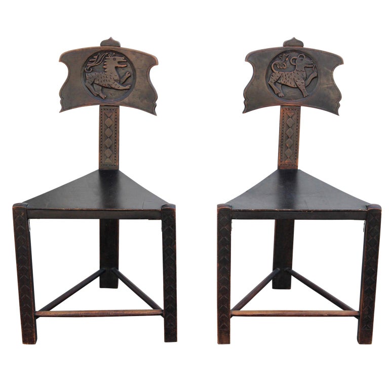 Interesting Unusual Pair of Tri Leg Carved Dark Brown Wood Lion Ram Chairs For Sale