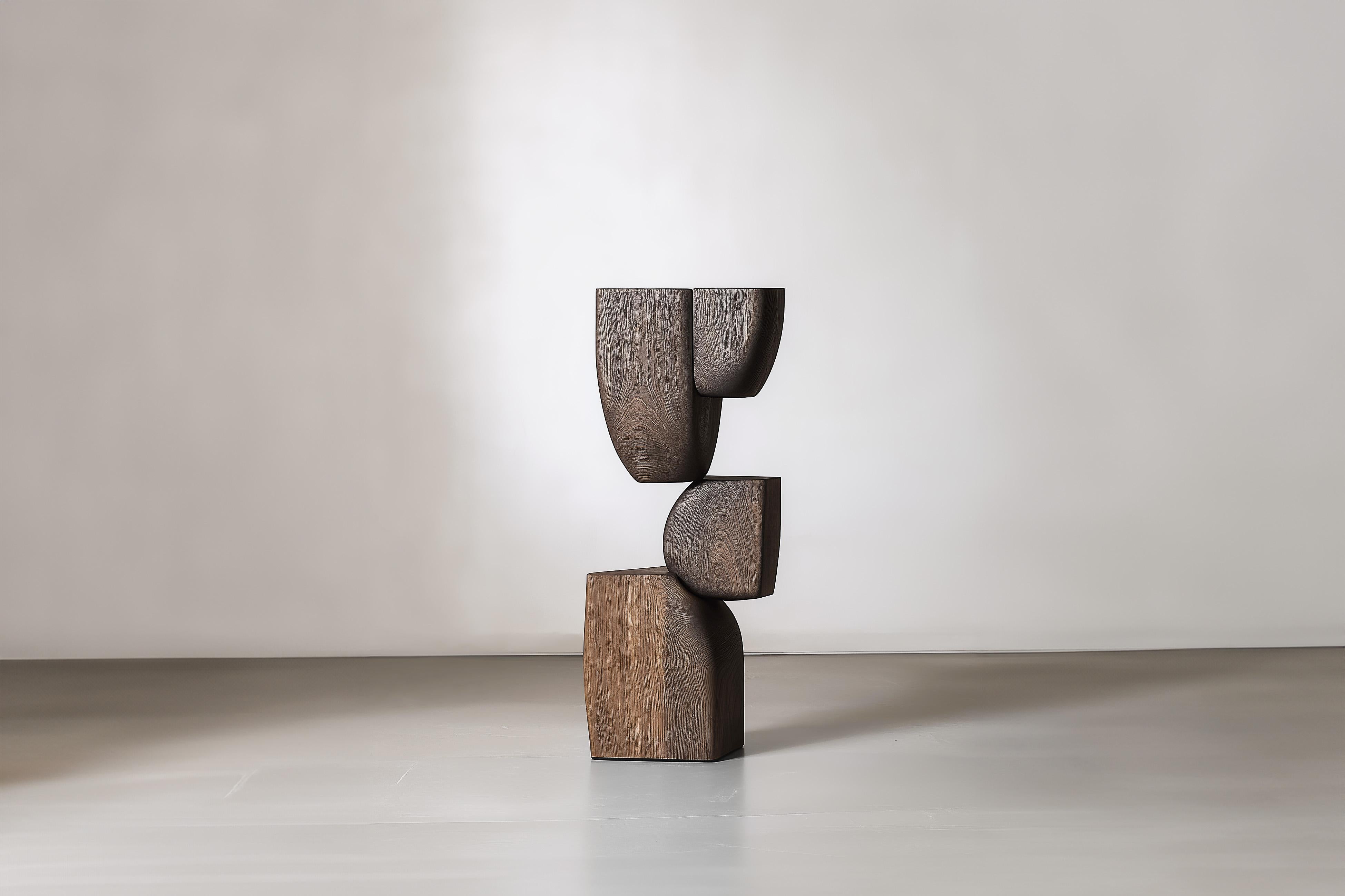 Interiorismo Pieza de Arte Lull No43 - Escultura de Madera de NONO para Espacios Modernos


---
El equilibrio y la tensión son el núcleo de estas esculturas. La interacción entre las formas suaves y redondeadas y las bases sólidas y angulosas crea