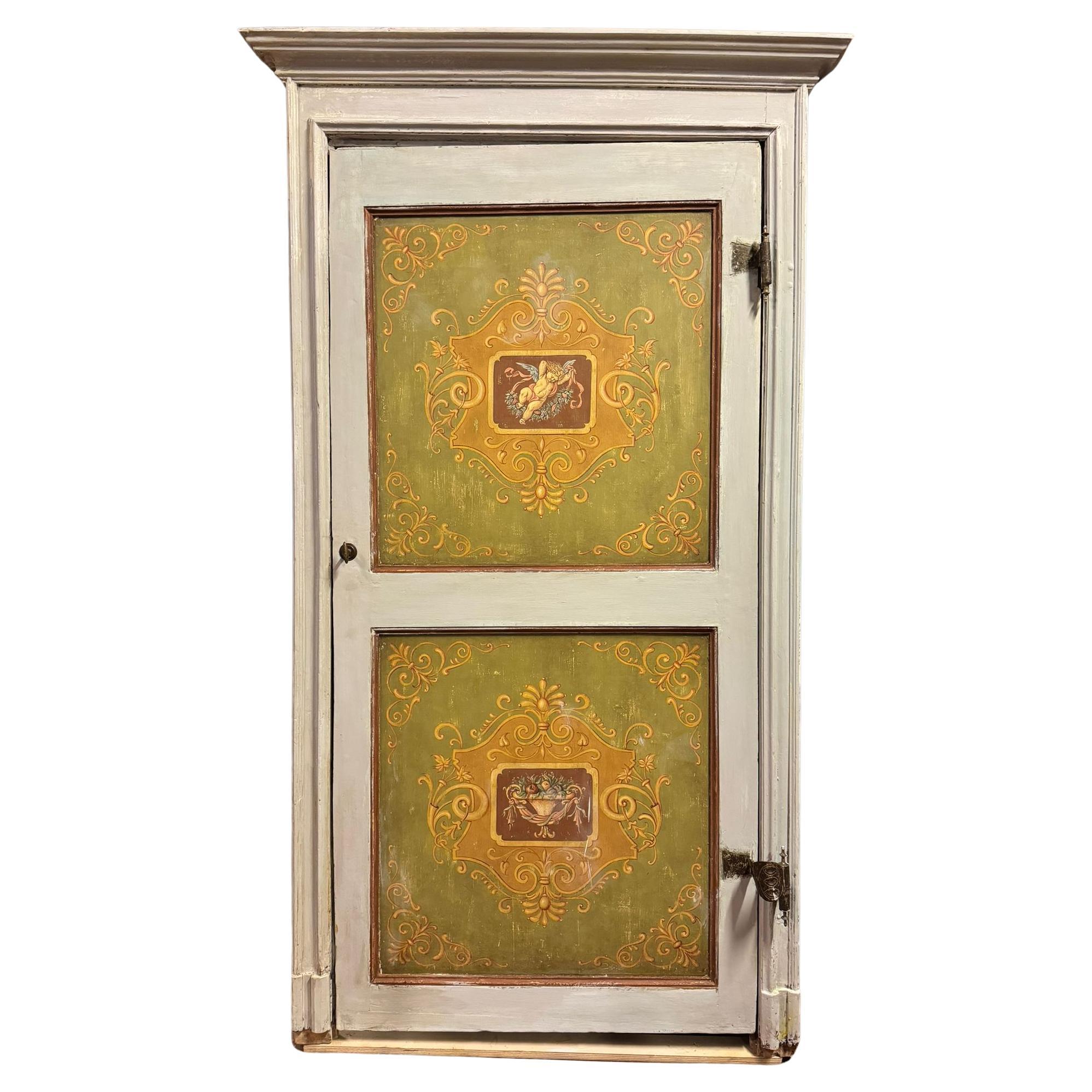 Interior door in lacquered and painted wood with cherubs, Italy