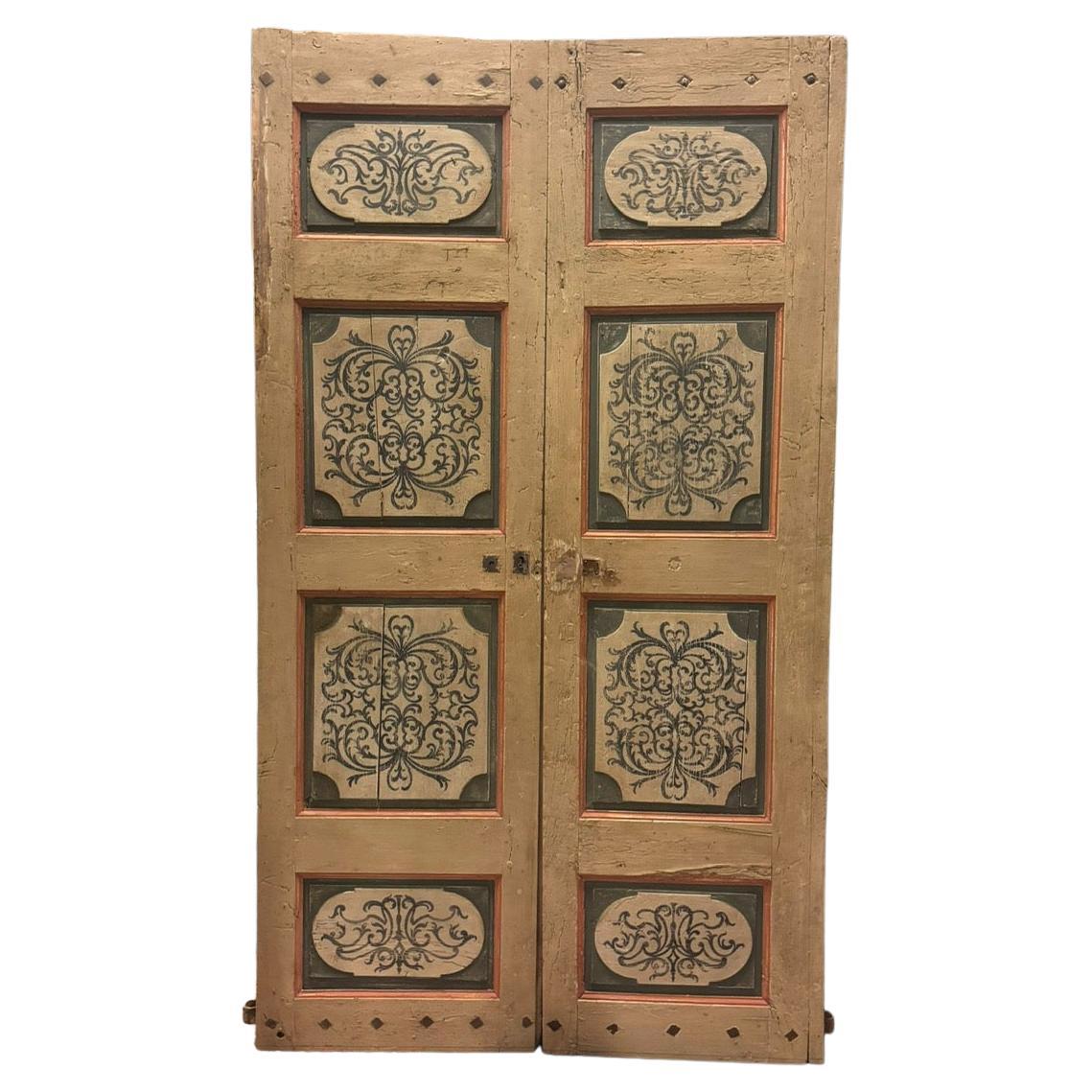 Puerta interior de madera lacada, dos hojas con paneles pintados, Italia