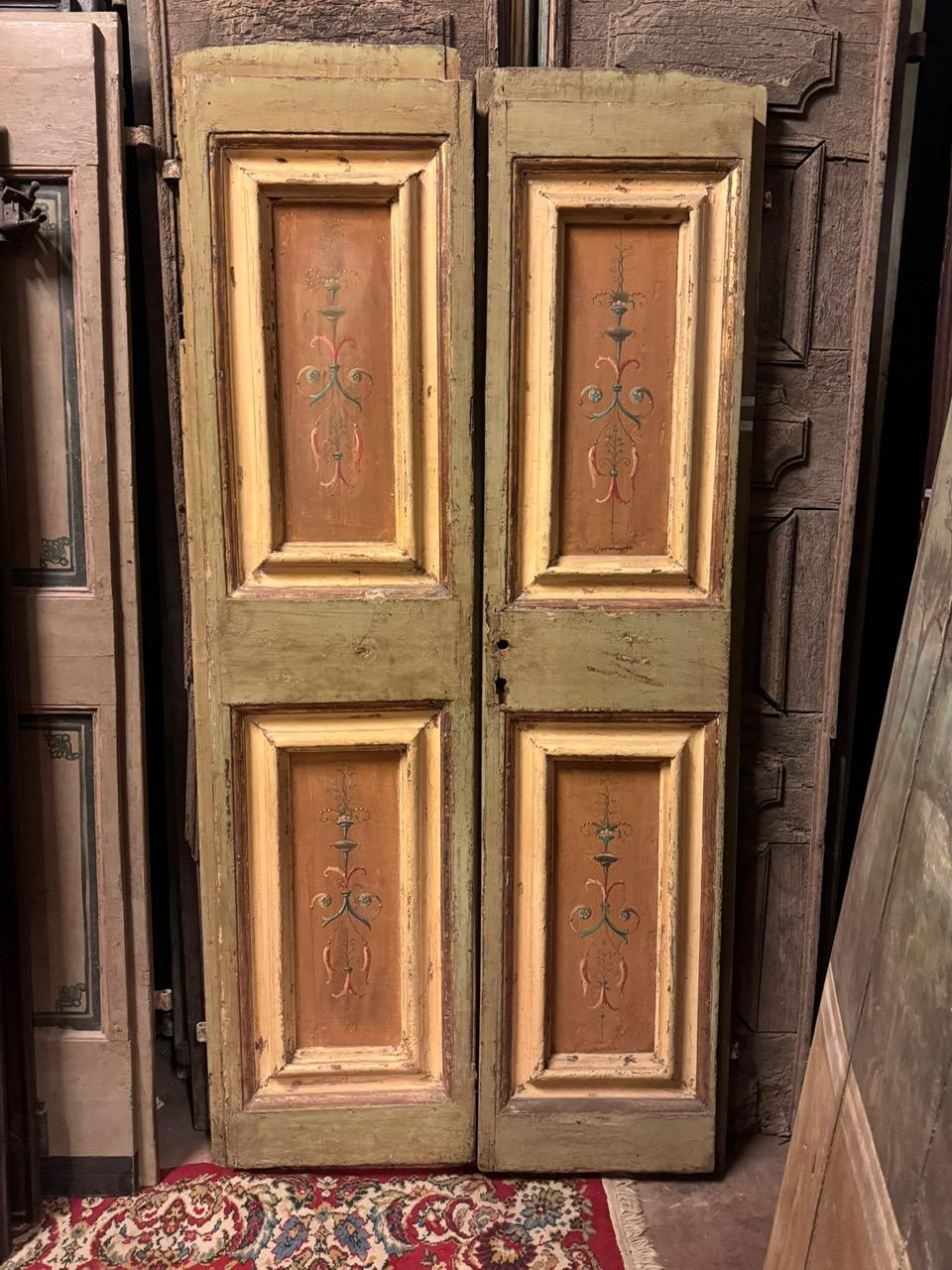 Antique interior door, lacquered wood with two doors and internal painted panels, original from the 18th century and from Umbria (Italy).
White lacquered back (to be stripped if desired, as it is not the original lacquer), has a push opening but