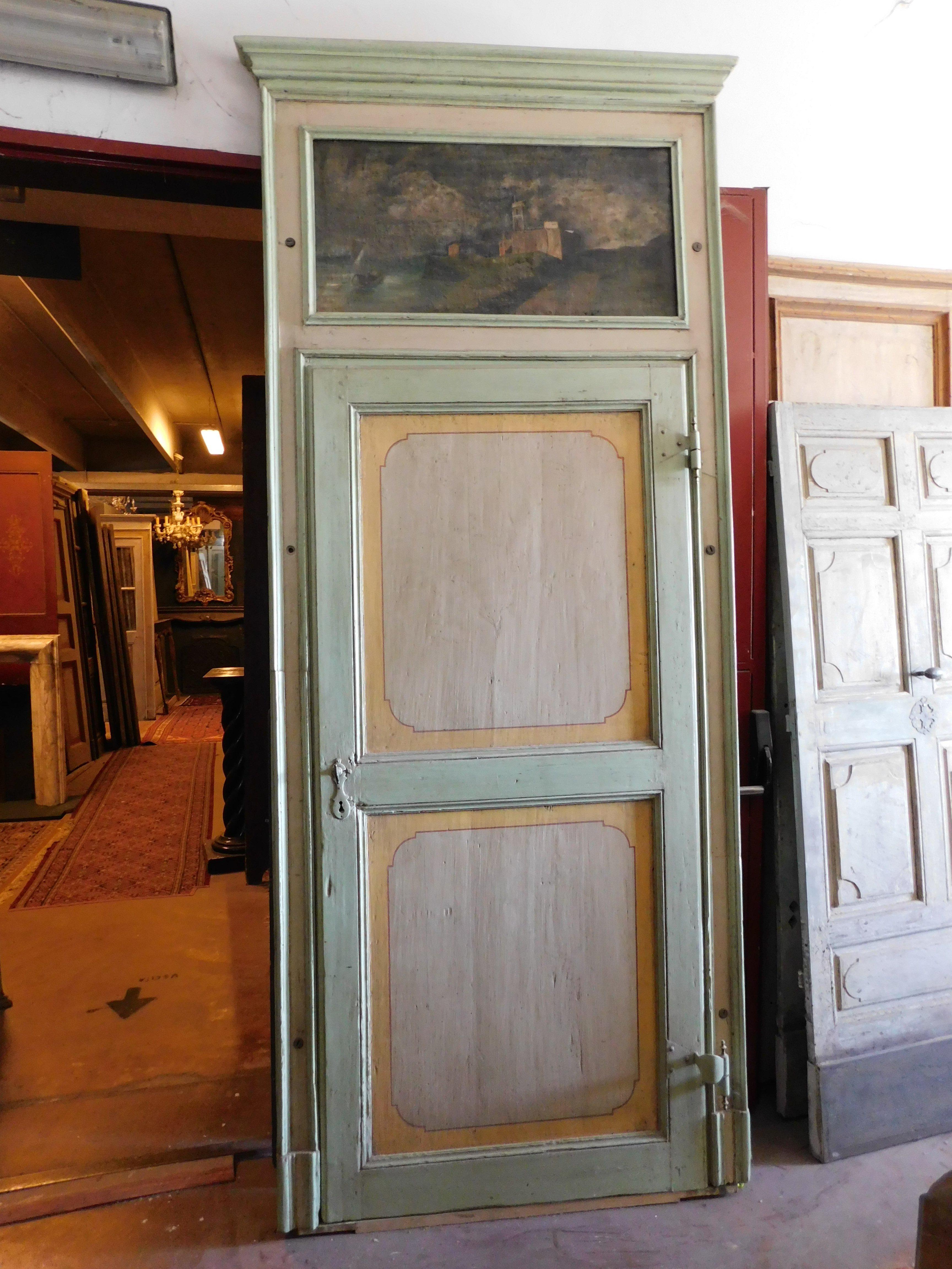 Antique single-leaf interior door, made of solid wood hand-painted in aqua green and yellow with beige, complete with original frame and overdoor painted on canvas with landscape, built for an important building with high ceilings in Italy, simple