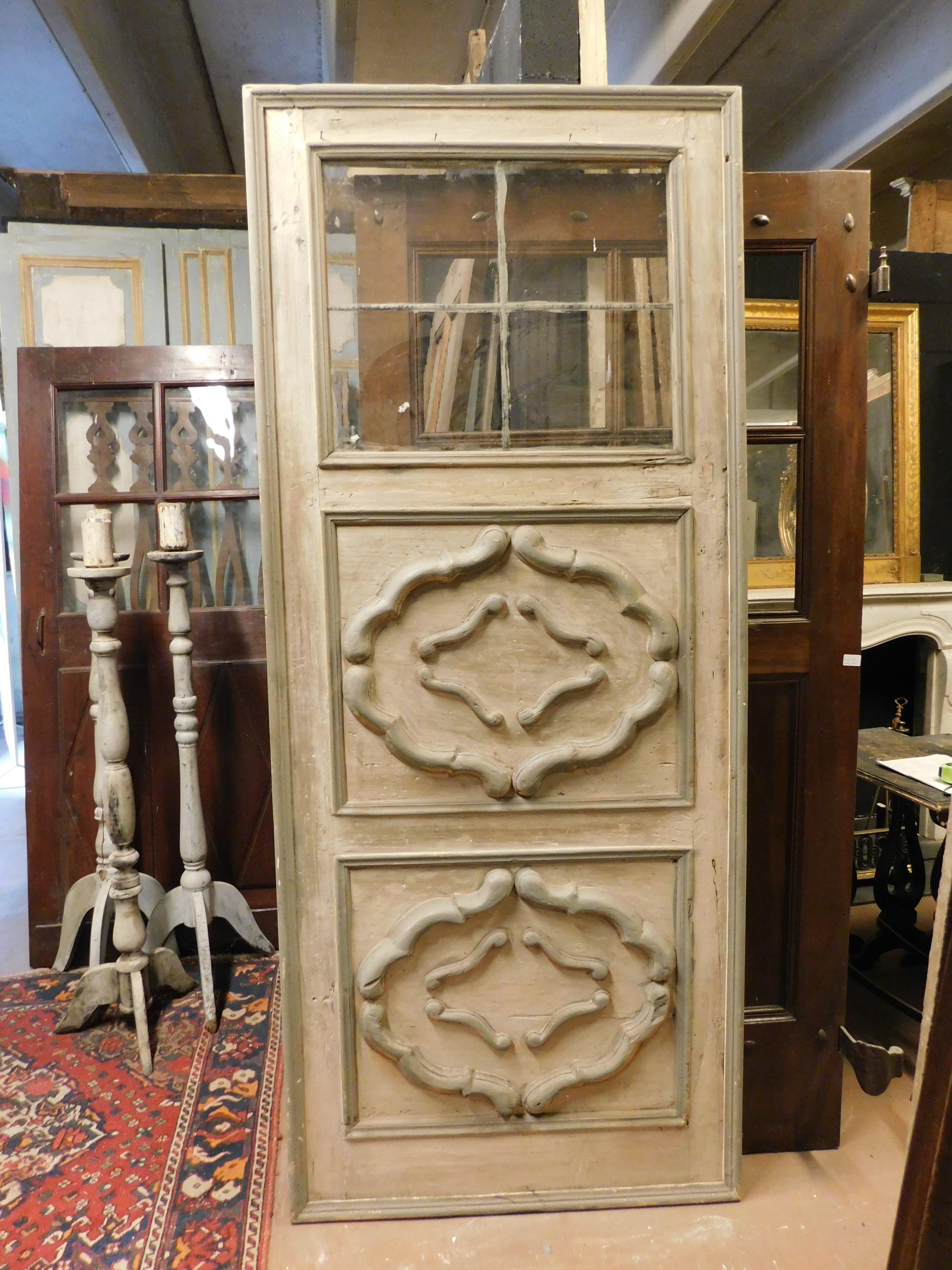 Puerta interior con paneles decorados y cristal, Italia Italiano en venta