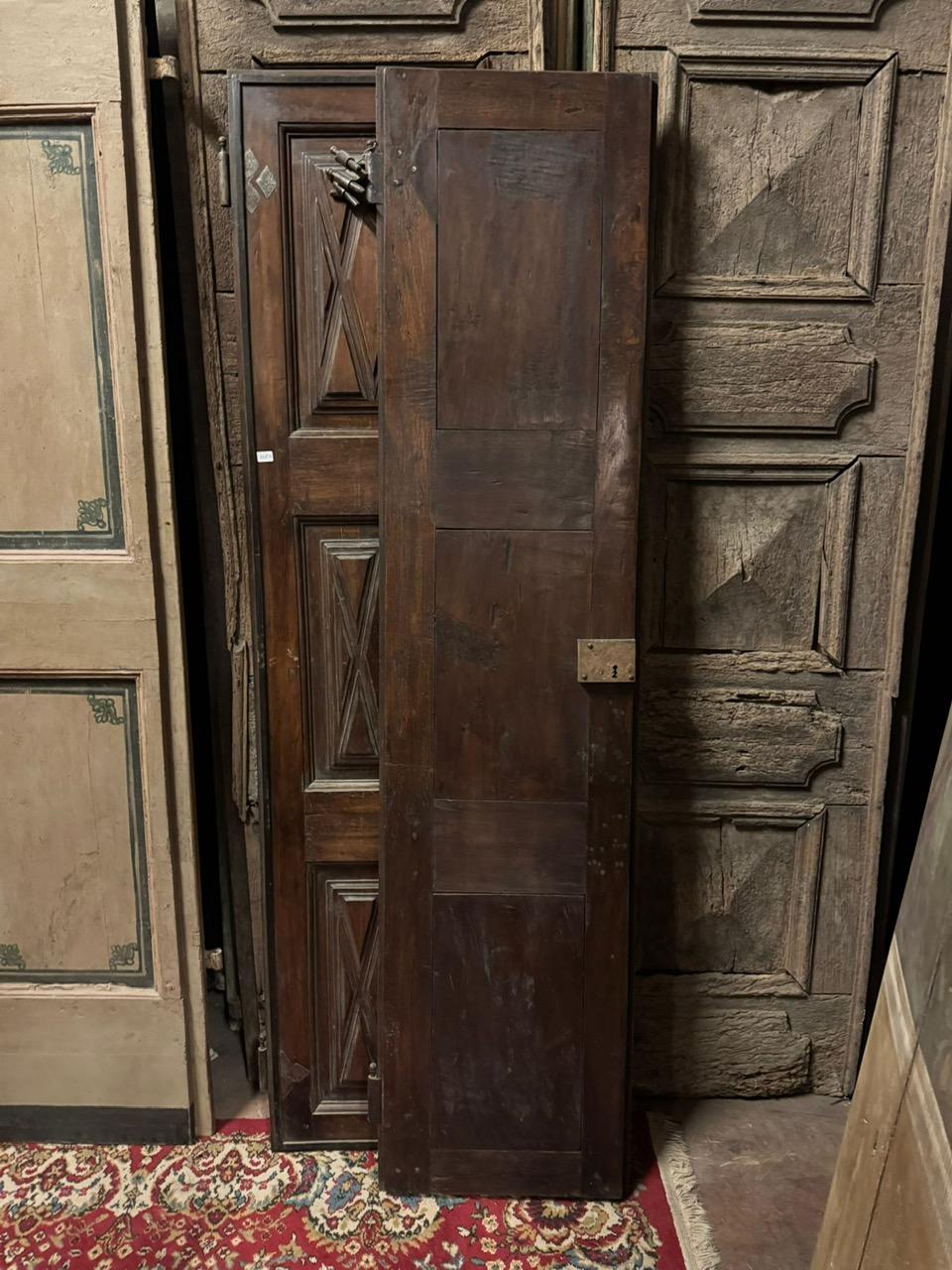 Walnut Interior double-leaf walnut door, panels carved with geometric shapes, Italy For Sale