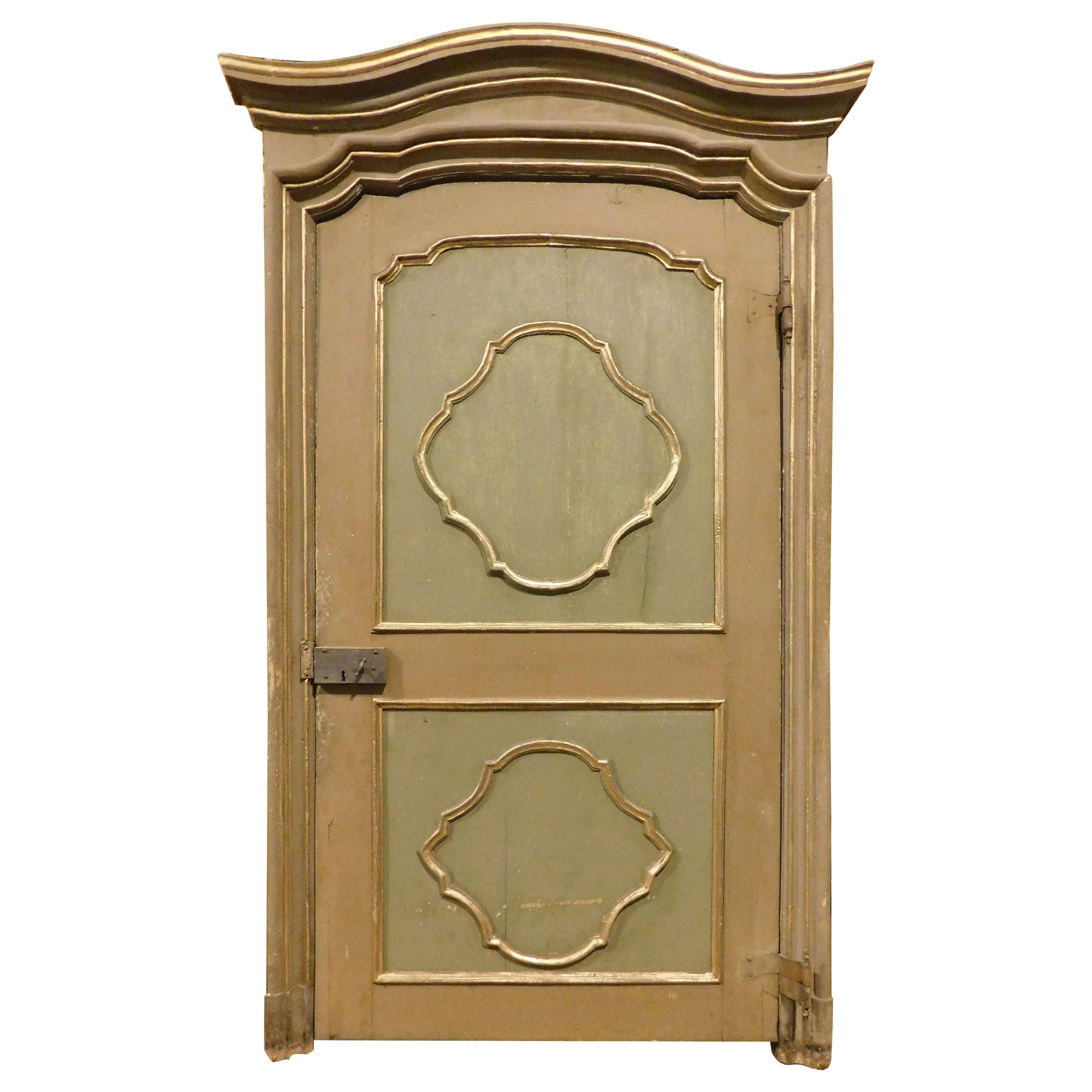 Interior old door lacquered and gilded, with one leaf with original frame, Italy