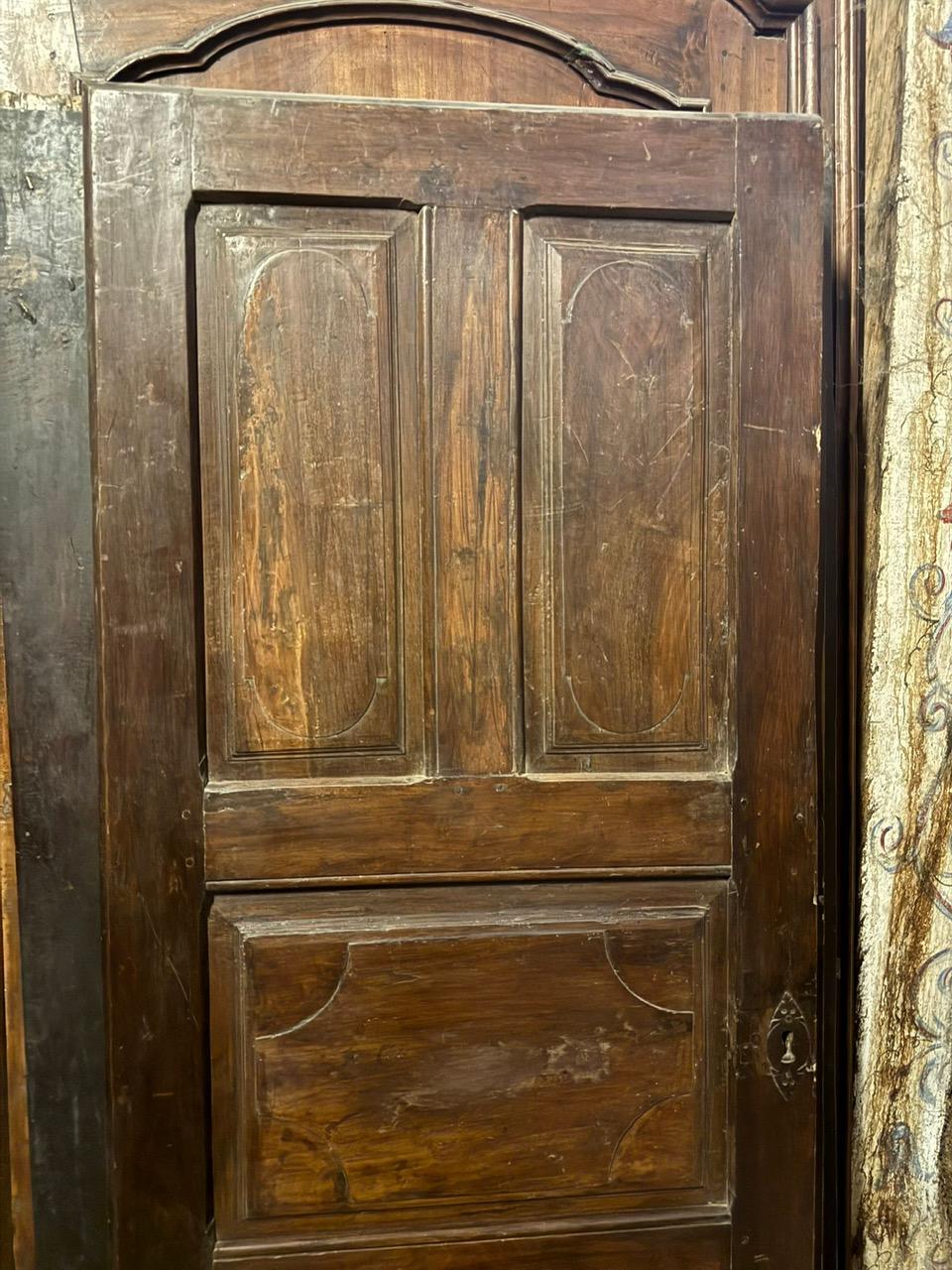 18th Century and Earlier Interior walnut door with carved panels, Italy For Sale