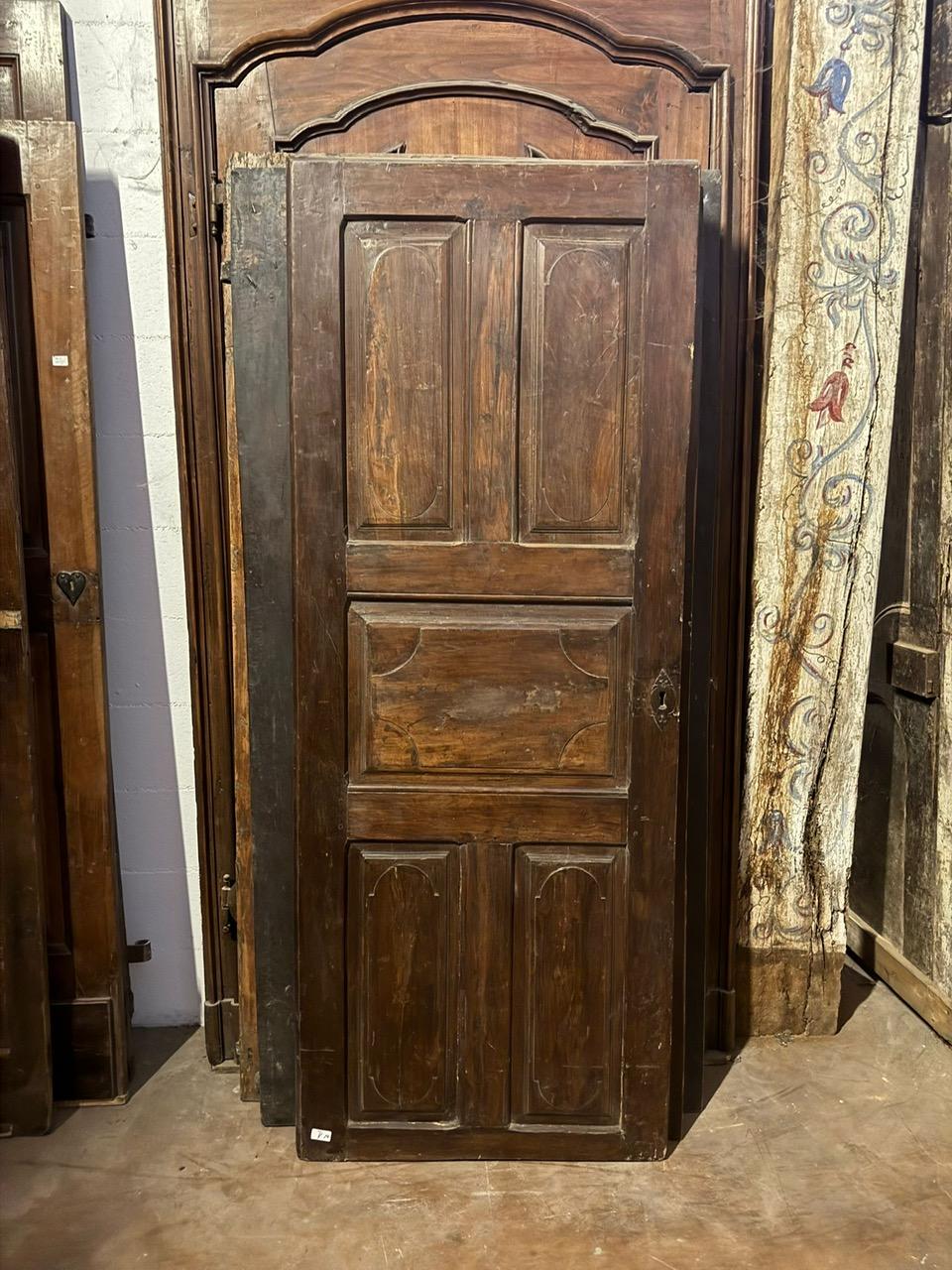 Interior walnut door with carved panels, Italy For Sale 1