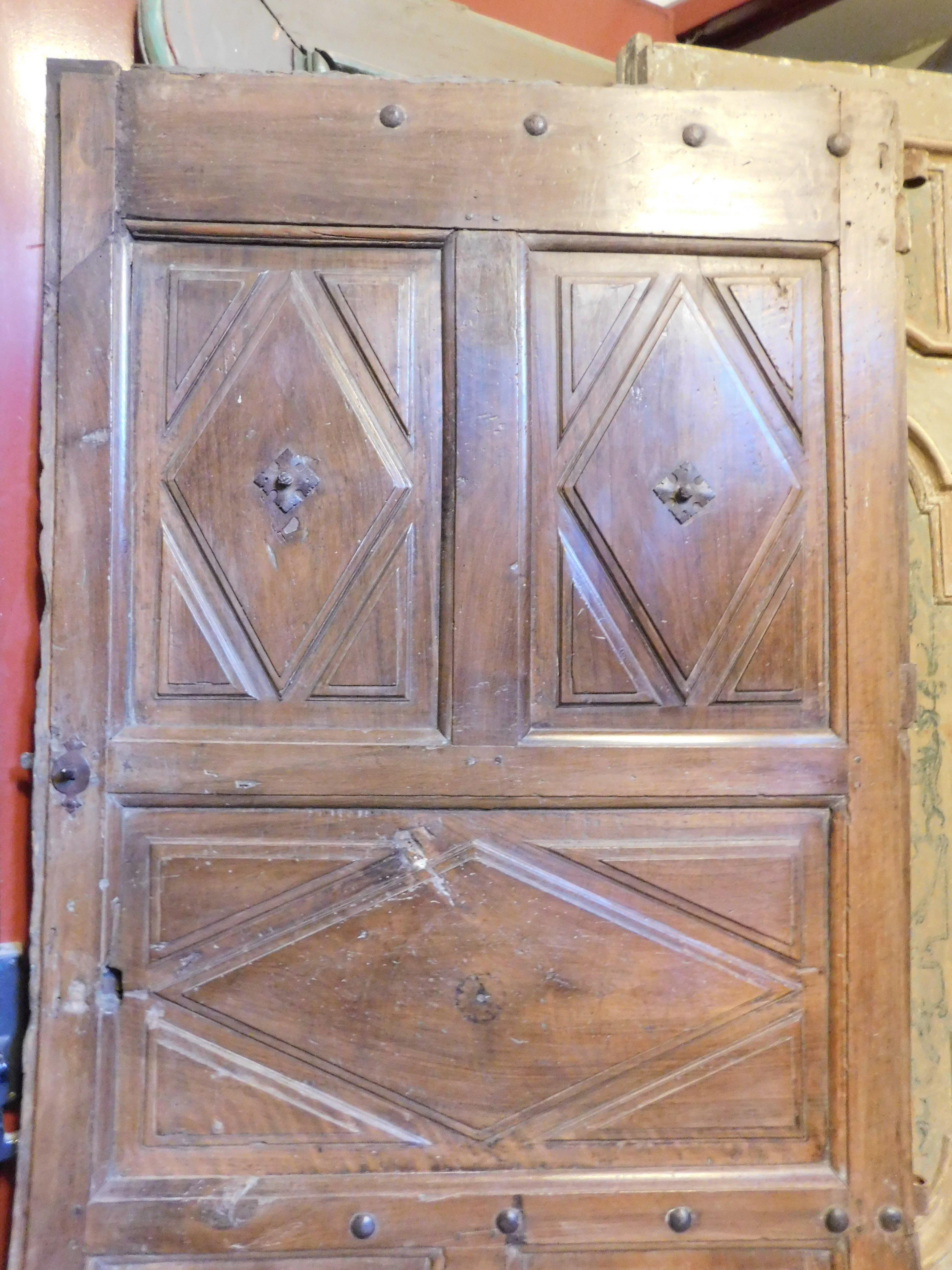 Walnut Interior wooden door with diamond-shaped carved panels, Italy For Sale