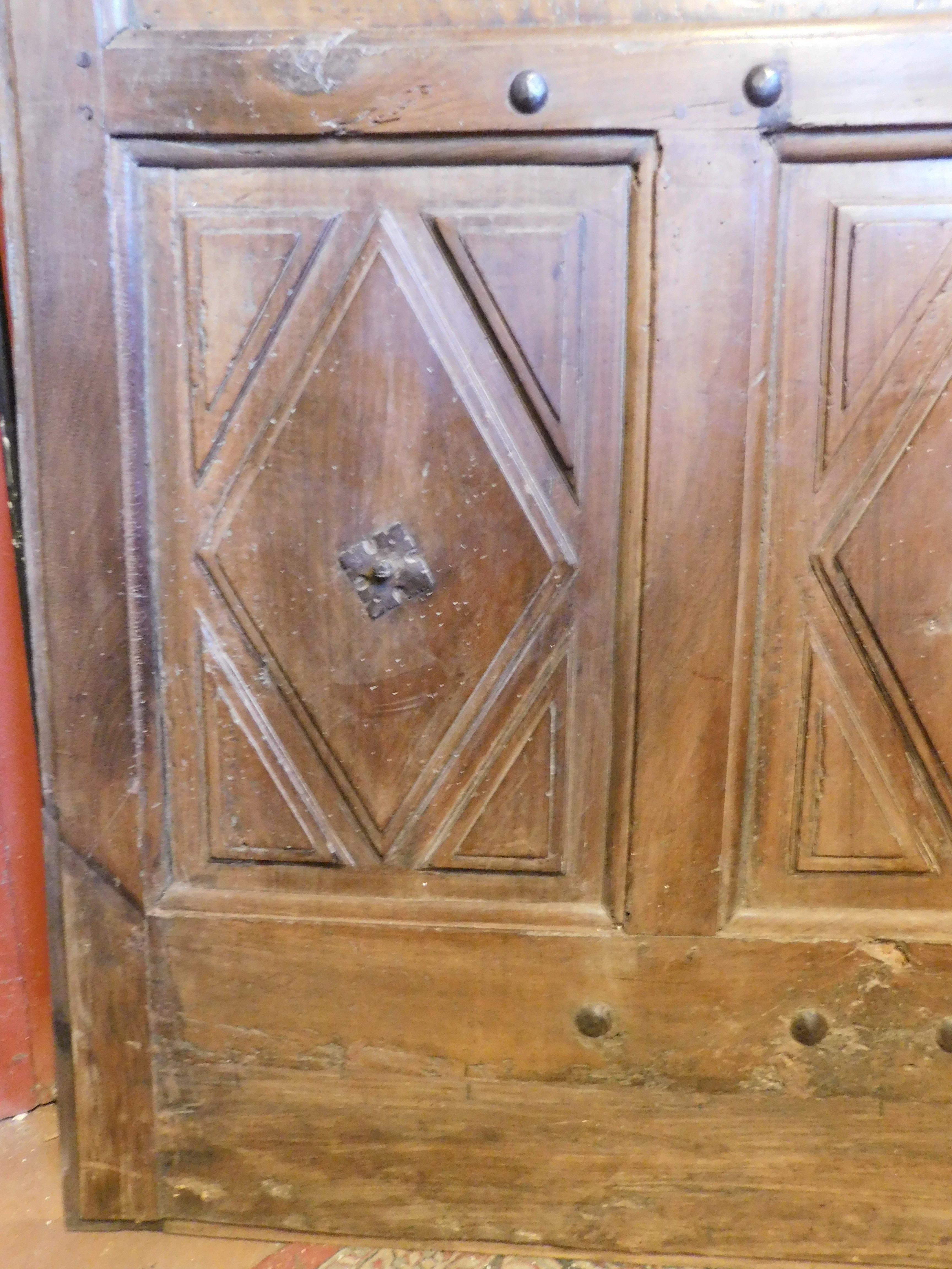 Interior wooden door with diamond-shaped carved panels, Italy For Sale 1