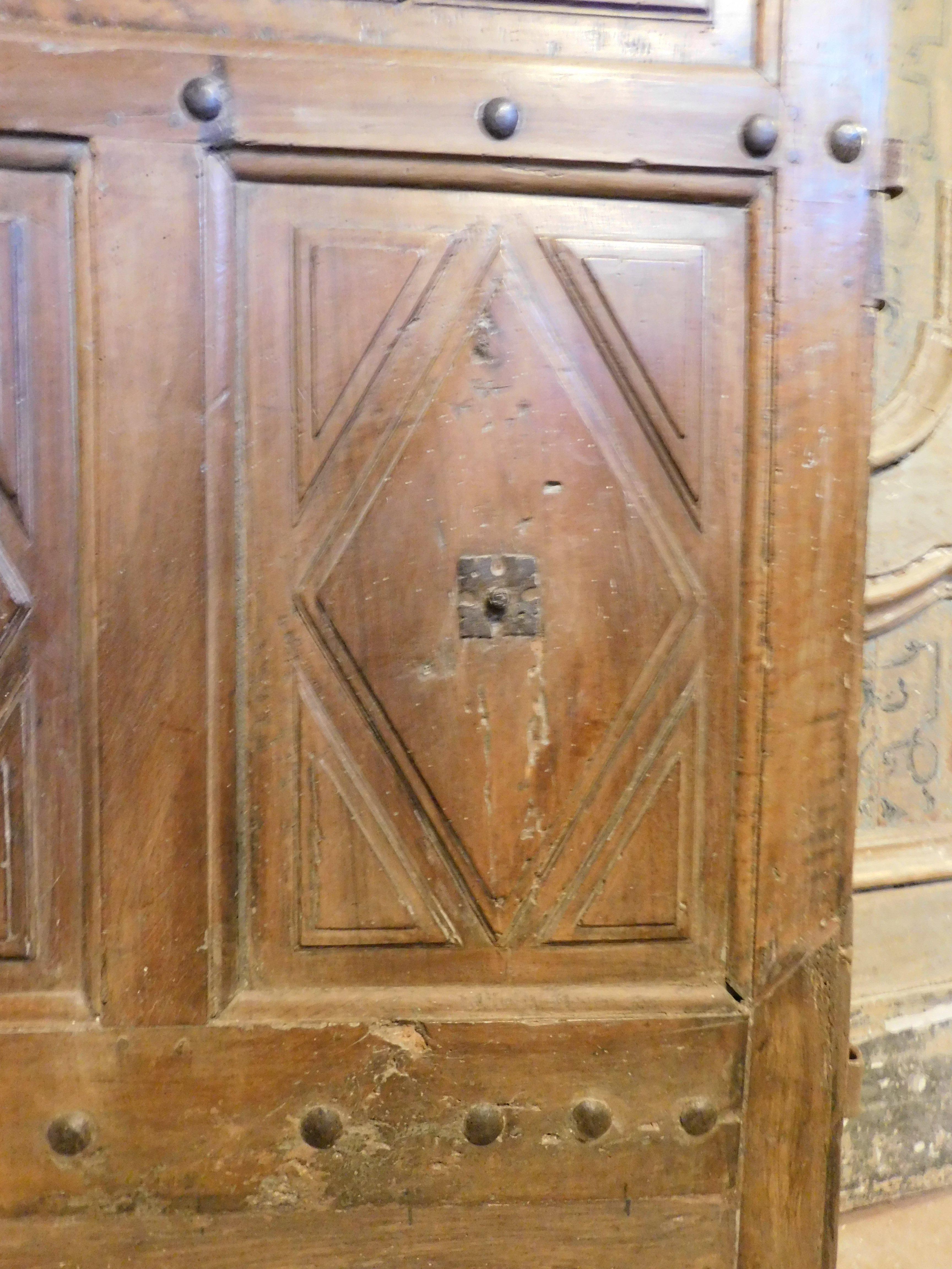 Interior wooden door with diamond-shaped carved panels, Italy For Sale 2