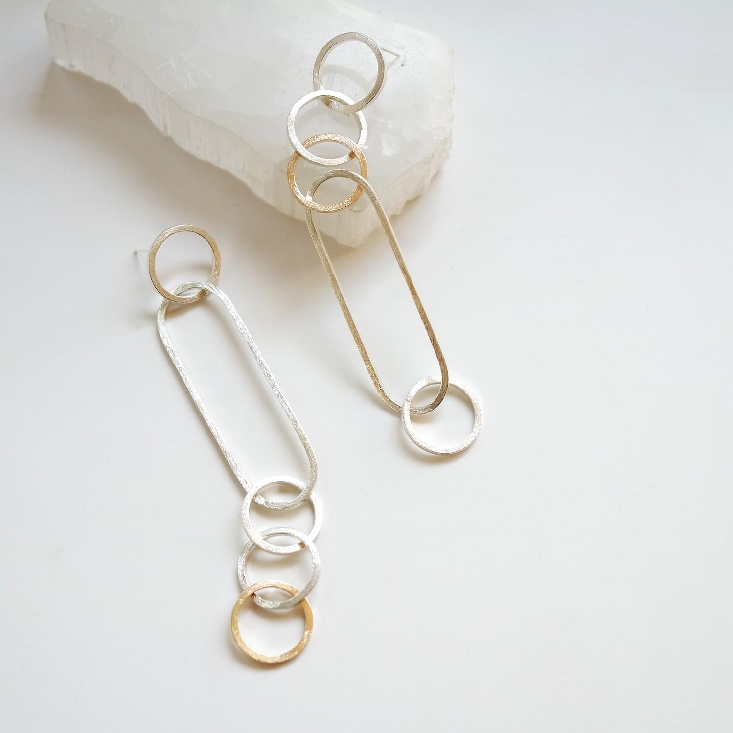 The Interlink Earrings were designed with strength, unity, and community in mind. Wear these earrings from day to night life as they transition smoothly from office to evening dress!

Meticulously handcrafted using recycled precious metals of thick
