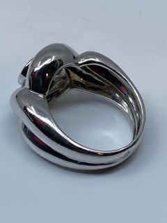 Interlocking Band Ring in 18 Carat Gold Set with a Diamond 0.80 Carat