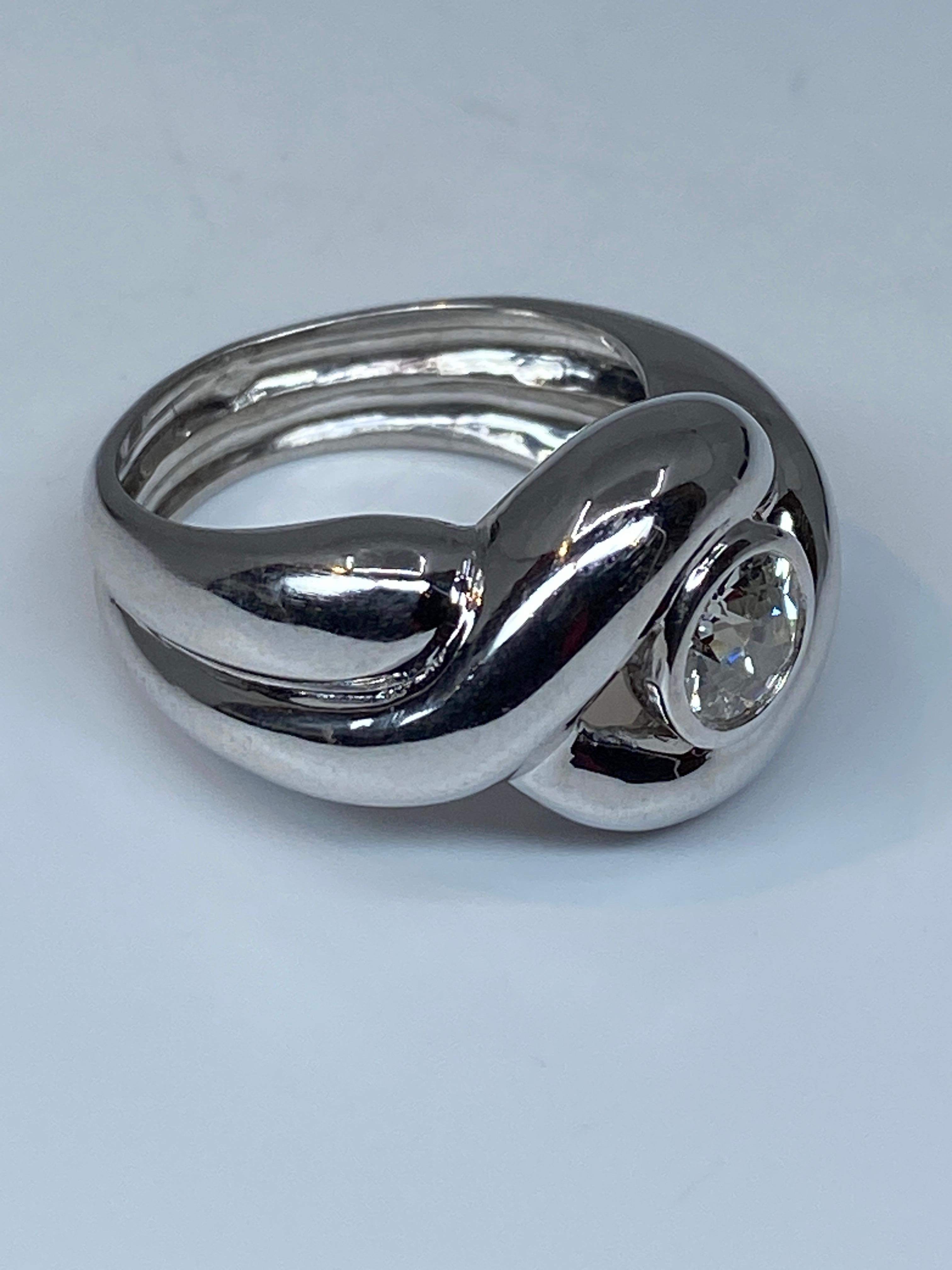 Romantic Interlocking Band Ring in 18 Carat Gold Set with a Diamond 0.80 Carat For Sale