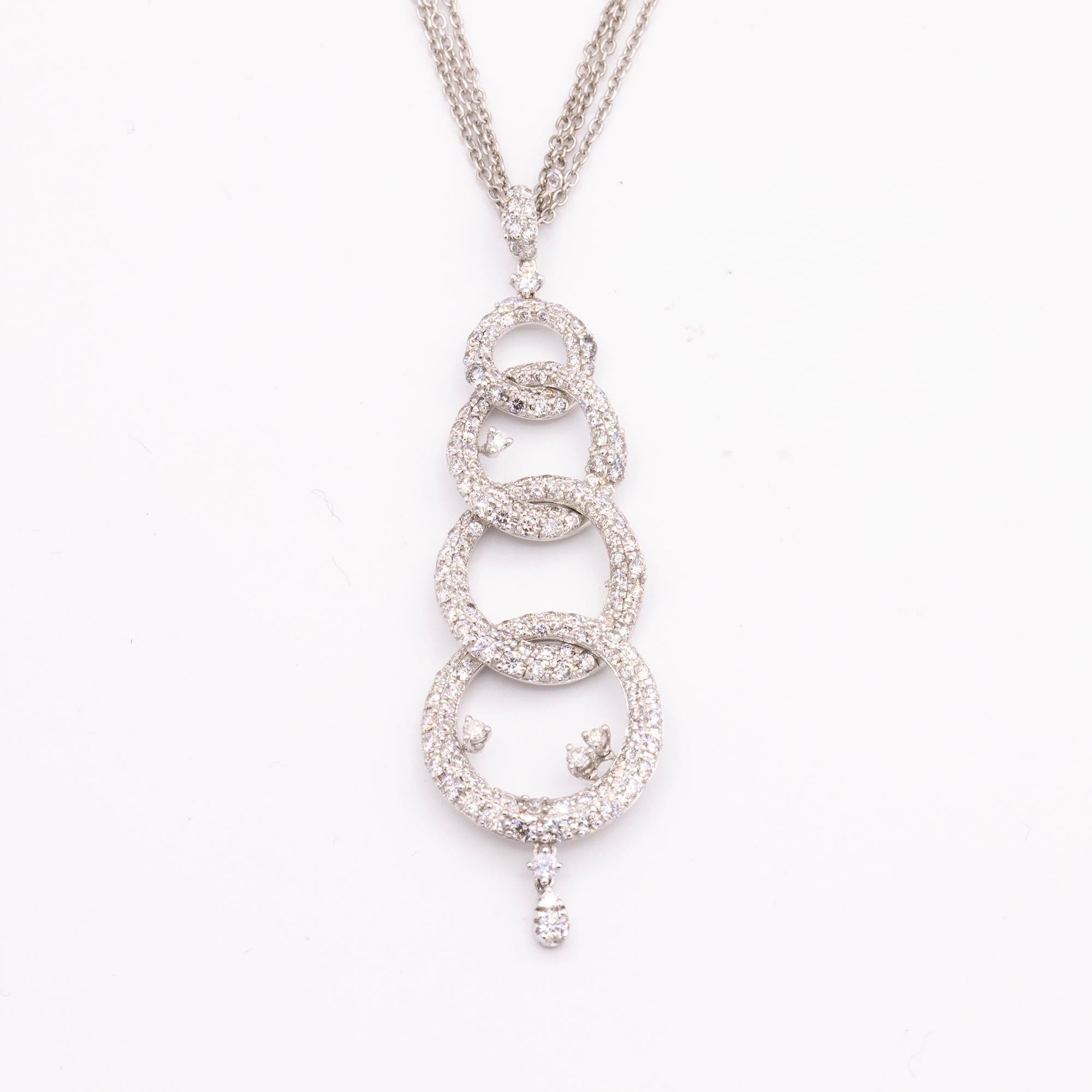 The Circle Game.  Making a modern statement of a traditional shape, this pendant hits all the marks.

Striking four interlocking diamond circle pendant on a triple strand chain. The chain is adjustable 16 to 18 inches. There are 194 round
