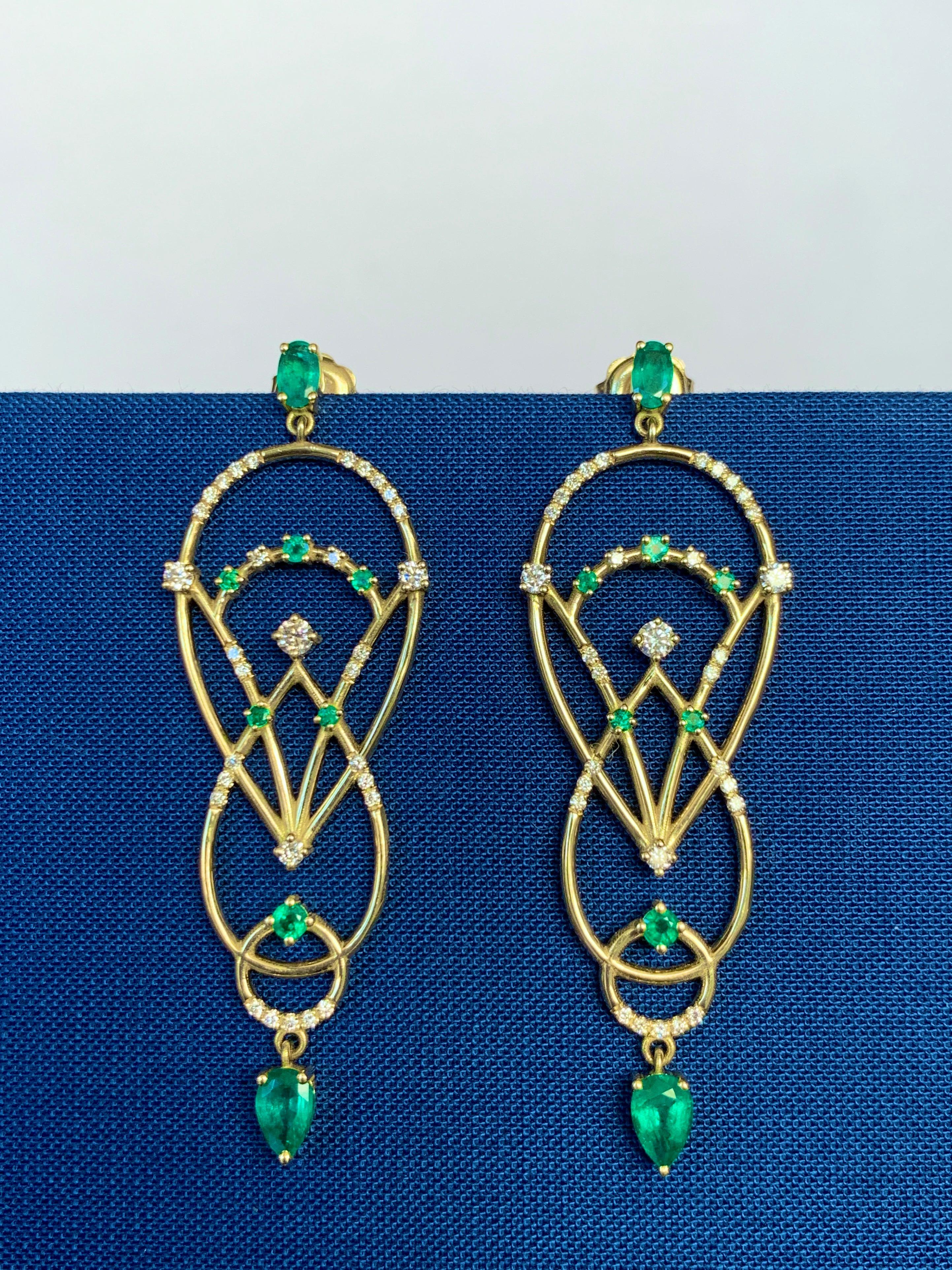 Designer: Alexia Gryllaki
Dimensions: L56x18mm
Weight: approximately 10.7g (pair)
Barcode: ING026E

The Interlocking Geometry earrings in 18 karat yellow gold with emeralds approx. 1.68cts and round brilliant-cut diamonds approx. 0.57cts.

About the
