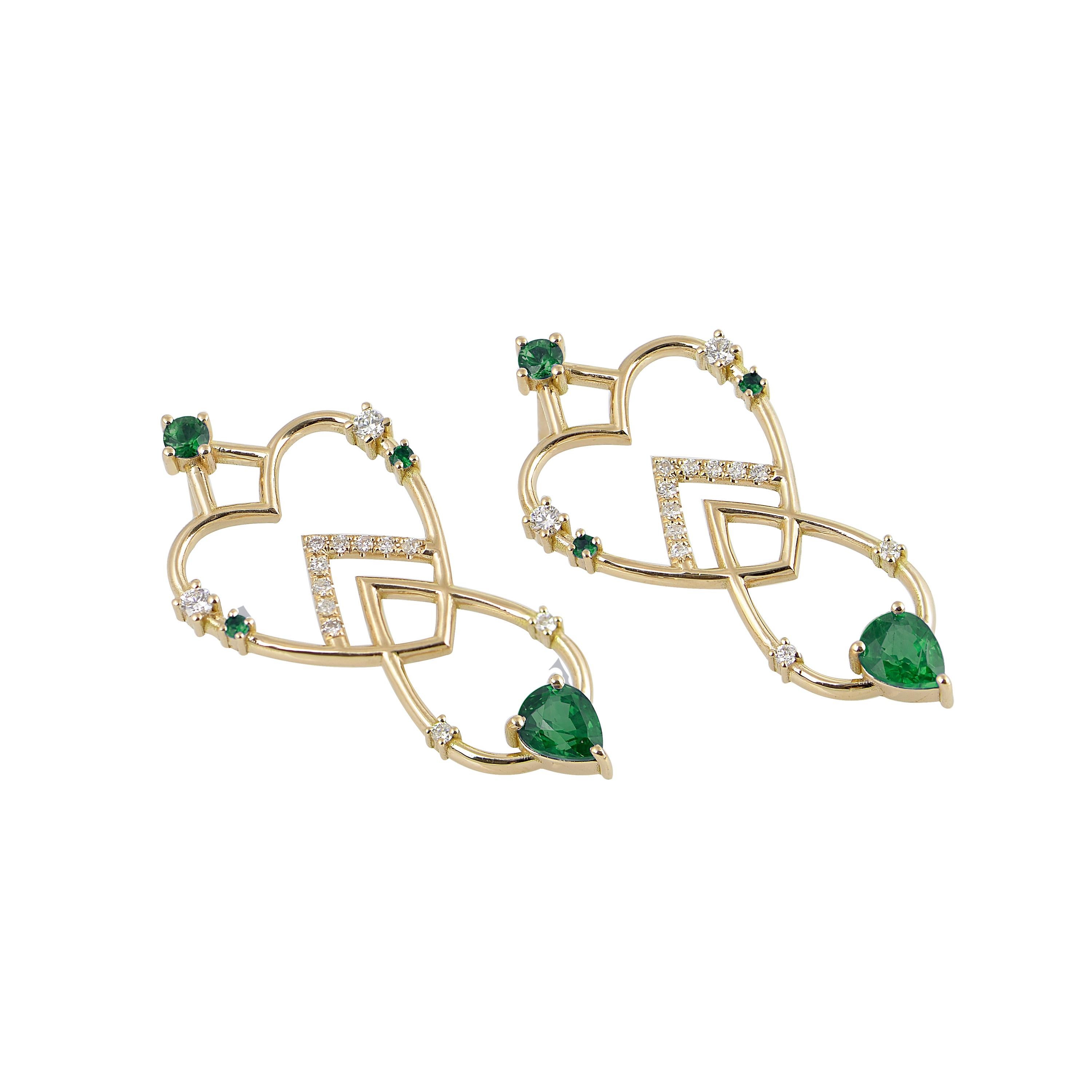 Designer: Alexia Gryllaki
Dimensions: L34x16mm
Weight: approximately 5.9g (pair)
Barcode: ING005EE

The Interlocking Geometry earrings in 18 karat yellow gold with emeralds approx. 0.91cts and round brilliant-cut diamonds approx. 0.24cts.

About the