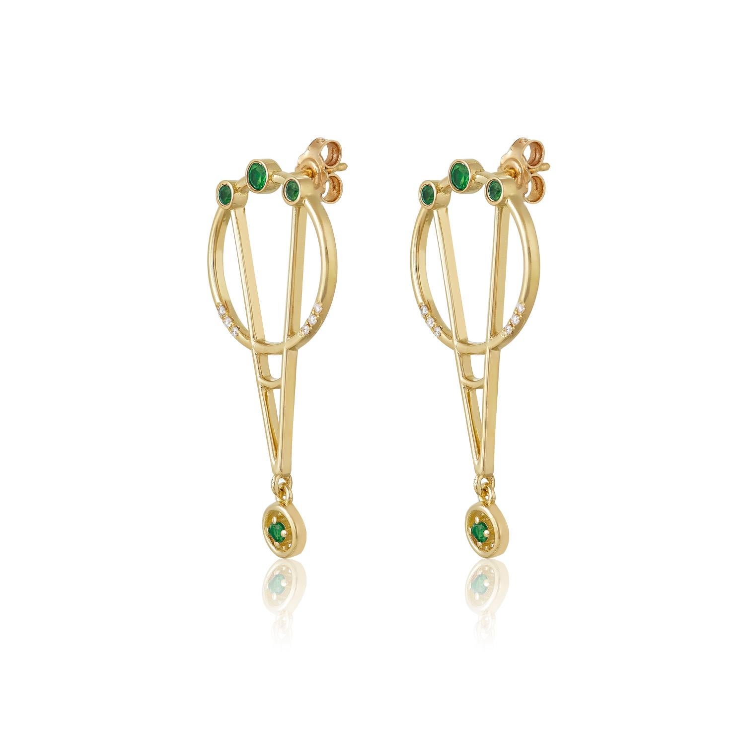 Designer: Alexia Gryllaki
Dimensions: L37x17mm
Weight: approximately 6.2g (pair)
Barcode: ING030EE

The Interlocking Geometry earrings in 18 karat yellow gold with emeralds approx. 0.40cts and round brilliant-cut diamonds approx. 0.06cts.

About the