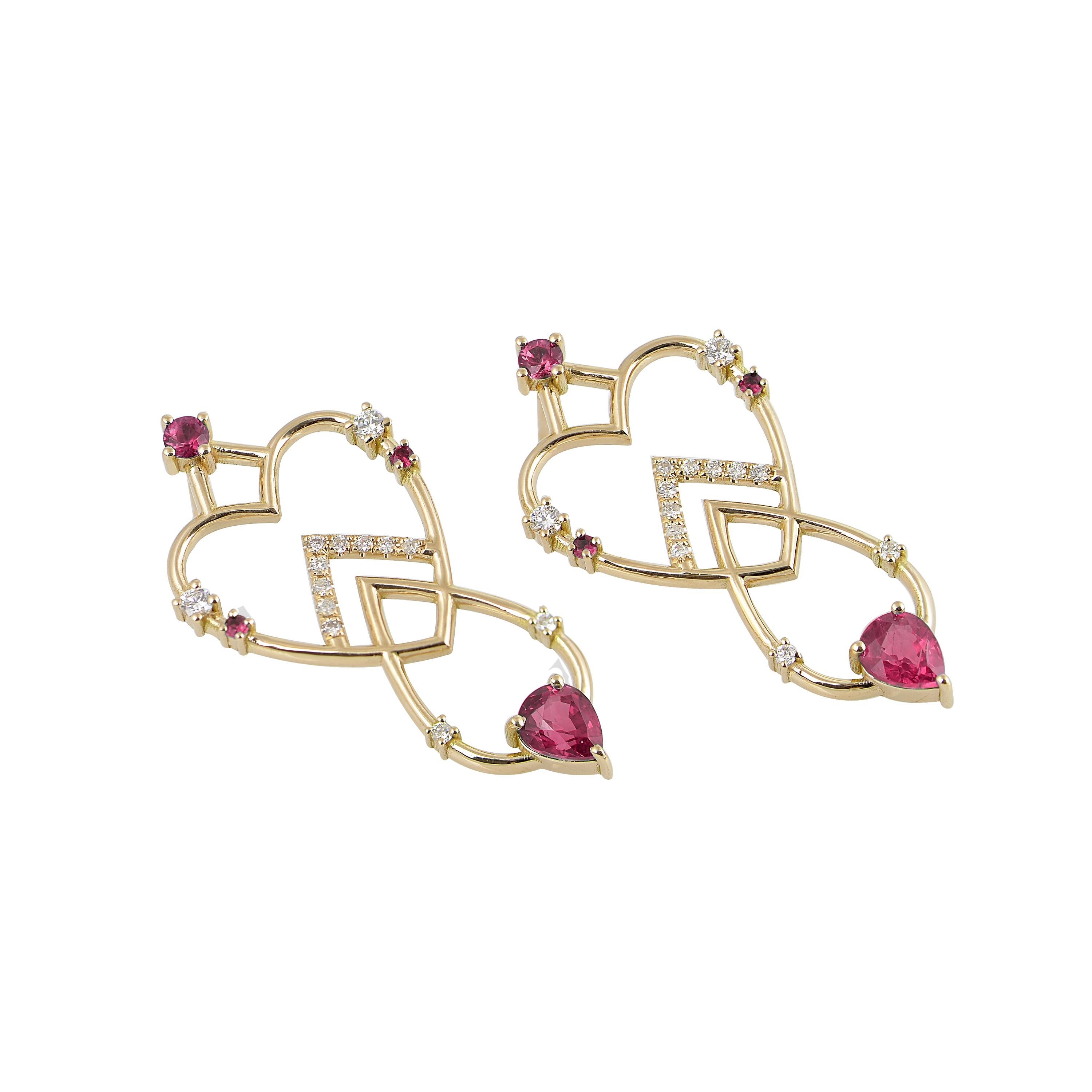 Designer: Alexia Gryllaki
Dimensions: L34x16mm
Weight: approximately 5.9g (pair)
Barcode: ING005ER

The Interlocking Geometry earrings in 18 karat yellow gold with rubies approx. 1.21cts and round brilliant-cut diamonds approx. 0.24cts.

About the