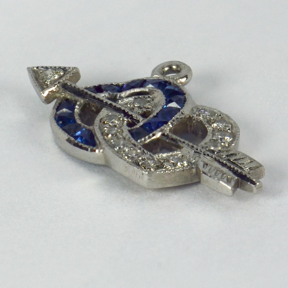 Art Deco Interlocking Hearts and Cupid’s Arrow Sapphire Diamond Platinum Charm Pendant