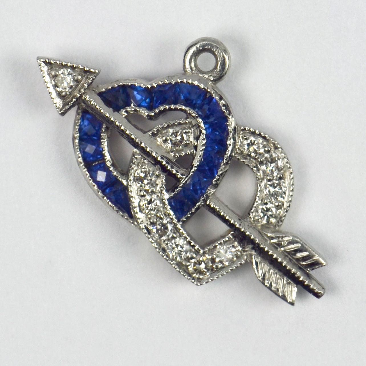 Interlocking Hearts and Cupid’s Arrow Sapphire Diamond Platinum Charm Pendant In Good Condition In London, GB