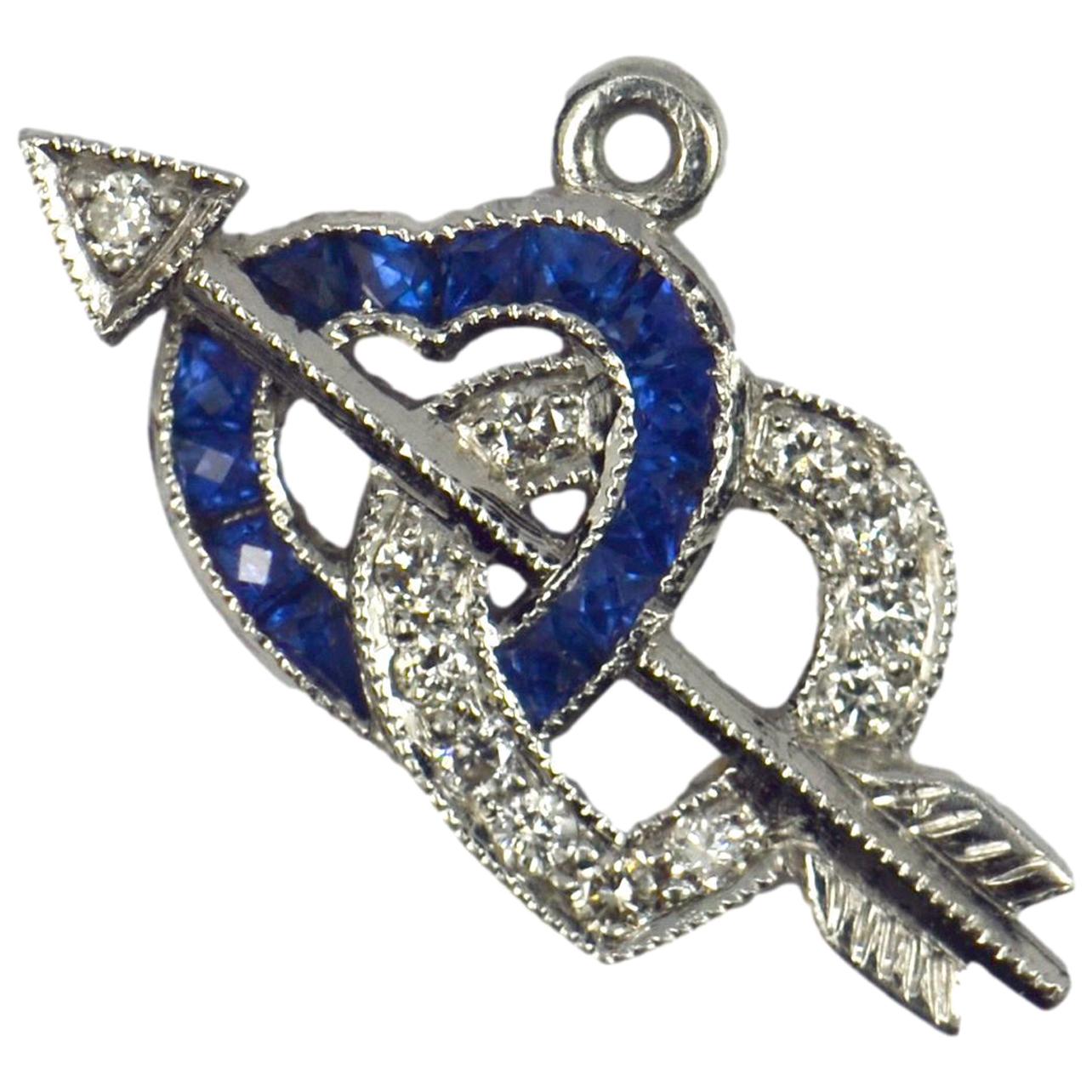 Interlocking Hearts and Cupid’s Arrow Sapphire Diamond Platinum Charm Pendant