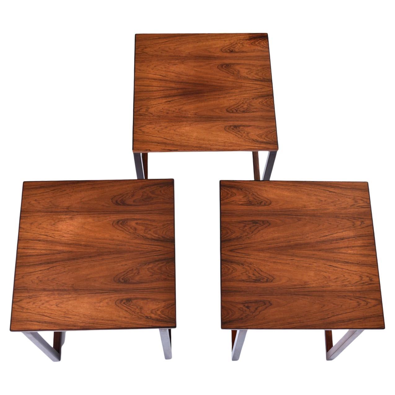 Absolutely masterfully designed nesting tables by Kai Kristiansen for Vildbjerg Mobler. The cube is actually three independent interlocking end tables that fit together like a 3D puzzle! The Danish have a tendency to be clever with functionality.