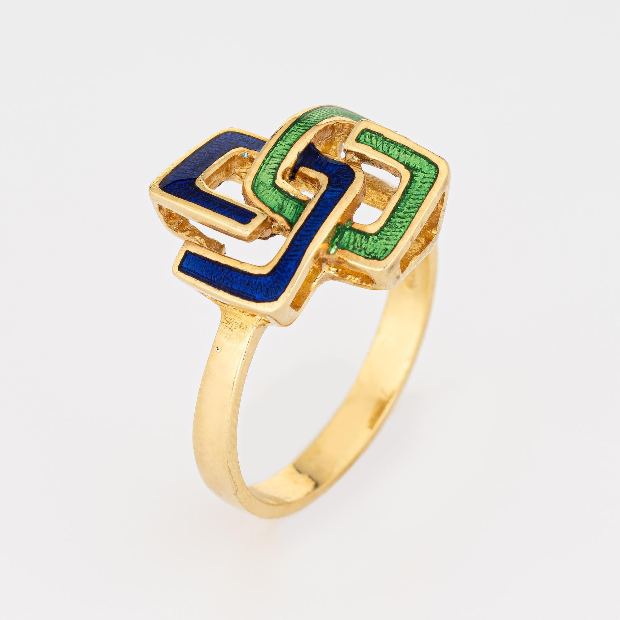 Stylish interlocking square infinity ring (circa 1960s to 1970s), crafted in 18 karat yellow gold. 

Green and blue enamel is set into the interlocking squares. Great for wear alone or stacked with your fine jewelry from any era.

The ring is in