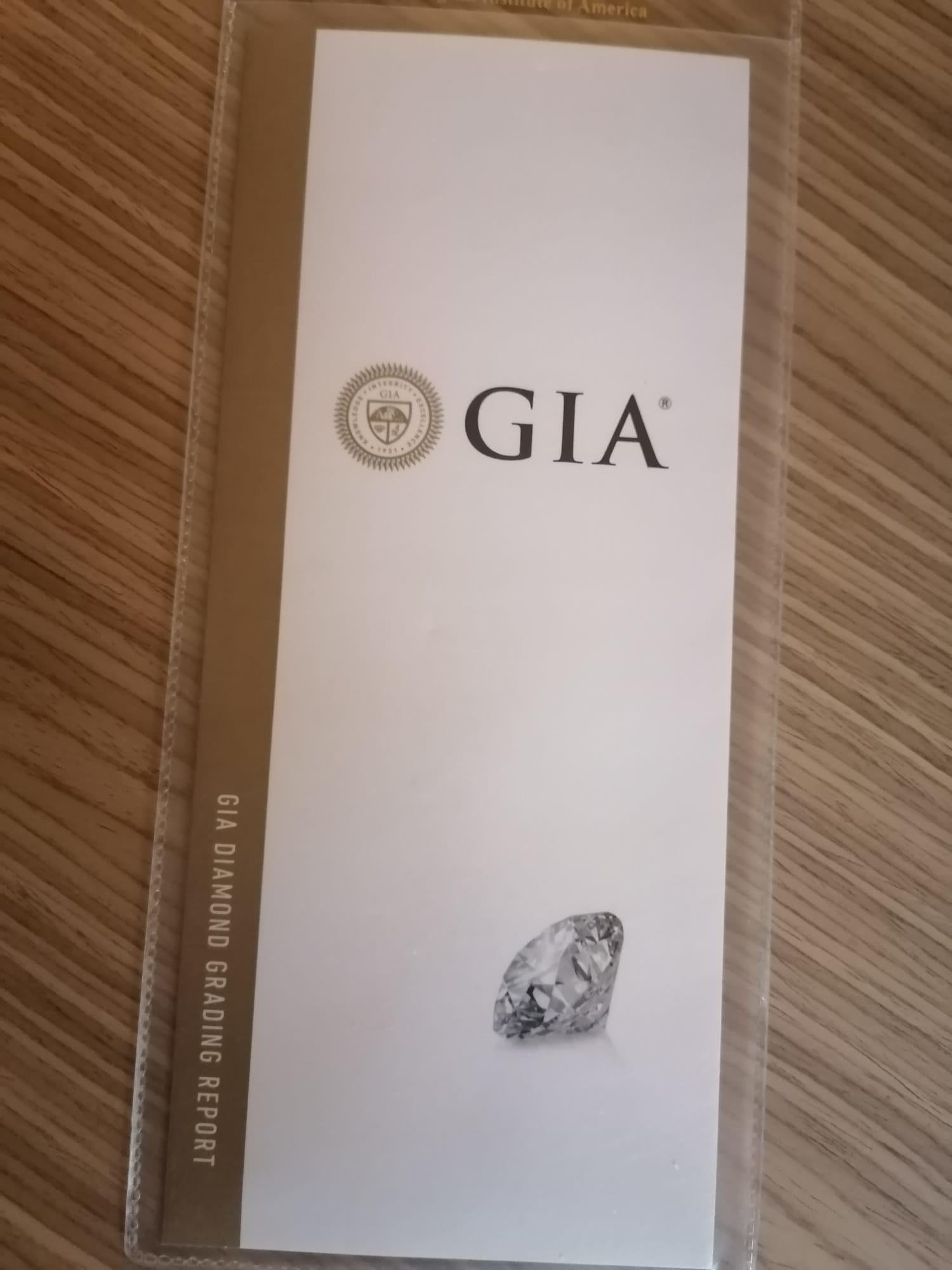 Modern GIA 2.70 Carat Emerald Cut Platinum Diamond 