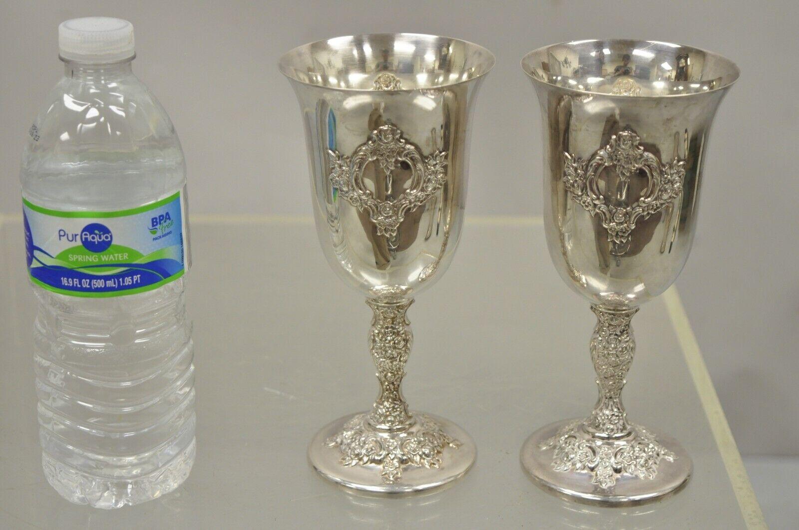 International silver Du Barry 7995 silver plated wine goblet cups - a pair. Circa early to mid 1900s. Measurements: 7