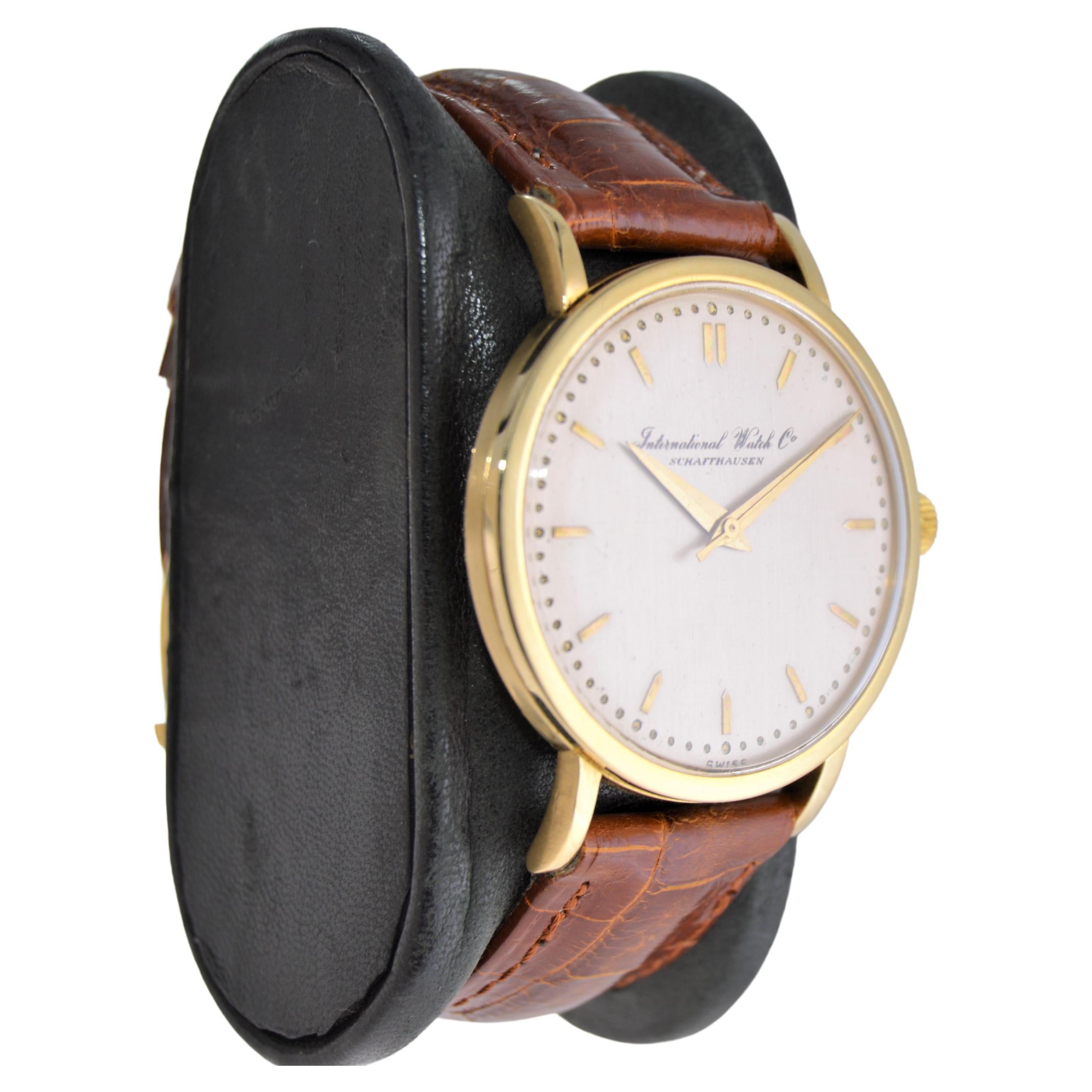 FACTORY / HOUSE: International Watch Company / Schaffhausen 
STYLE / REFERENCE: Art Deco / Round Dress Watch
METAL / MATERIAL: 18kt. Solid Gold 
CIRCA / YEAR: 1940's
DIMENSIONS / SIZE: Length 42mm x Diameter 35mm
MOVEMENT / CALIBER: Manual Winding /