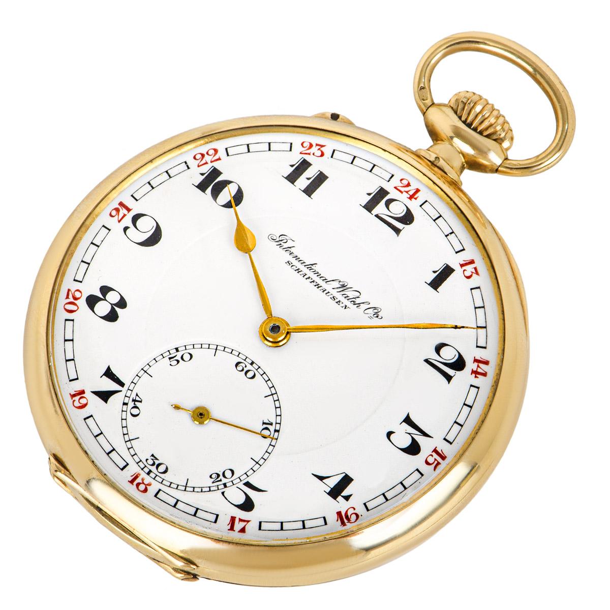 An International Watch Company 14ct yellow gold, keyless lever open face pocket watch, C1920s with it's original presentation box.

Dial: A Beautiful White Enamel Dial in perfect condition Arabic numerals with Red twenty four hour outer track