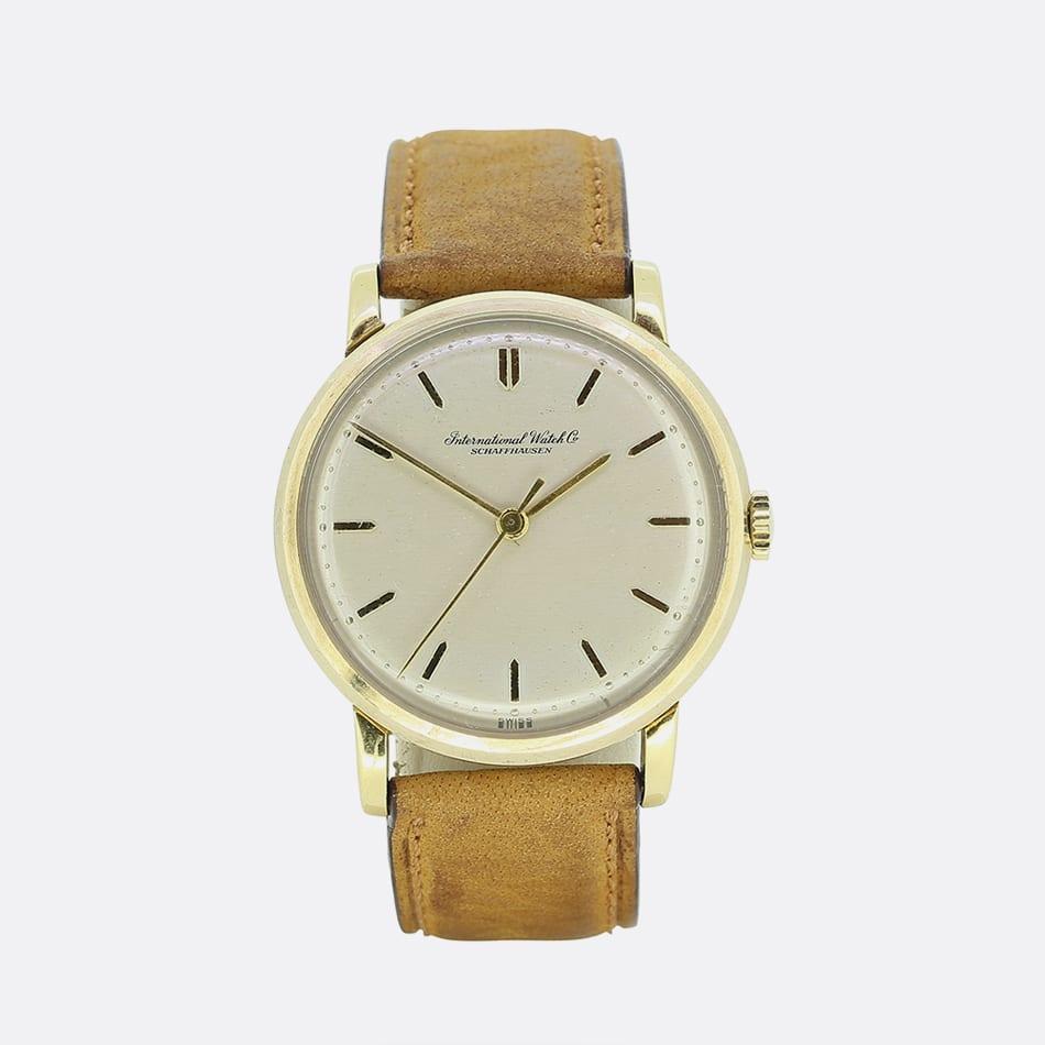 This is a vintage 18ct yellow gold watch from the designer IWC. The watch features all its original pieces but the strap and buckle have been replaced. 

The heritage of IWC is deeply rooted in American pioneering spirit and entrepreneurship.