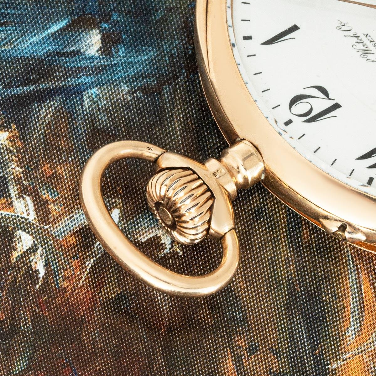 An International Watch Company 14ct yellow gold, keyless lever open face pocket watch, C1920s with it's original presentation box.

Dial: A Beautiful White Enamel Dial in perfect condition Arabic numerals with Red twenty four hour outer track