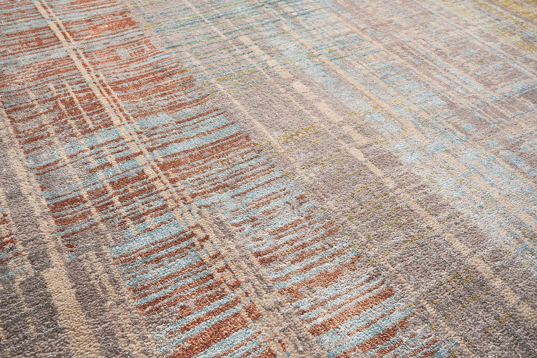 A beautiful, colourful carpet from the Intersections pattern, made in the 2000s. The carpet is made of beautifully visible hand-knotted wool and silk. What makes this carpet unique is its intertwining of colours, which makes it match any