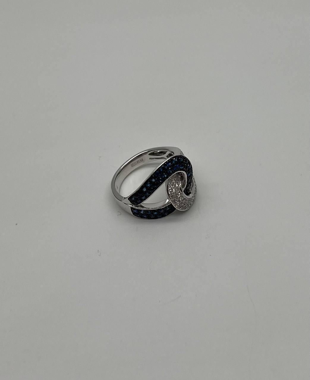 Women's Intertwining Blue Sapphires Diamonds Interlocking Shapes White Gold Fashion Ring For Sale