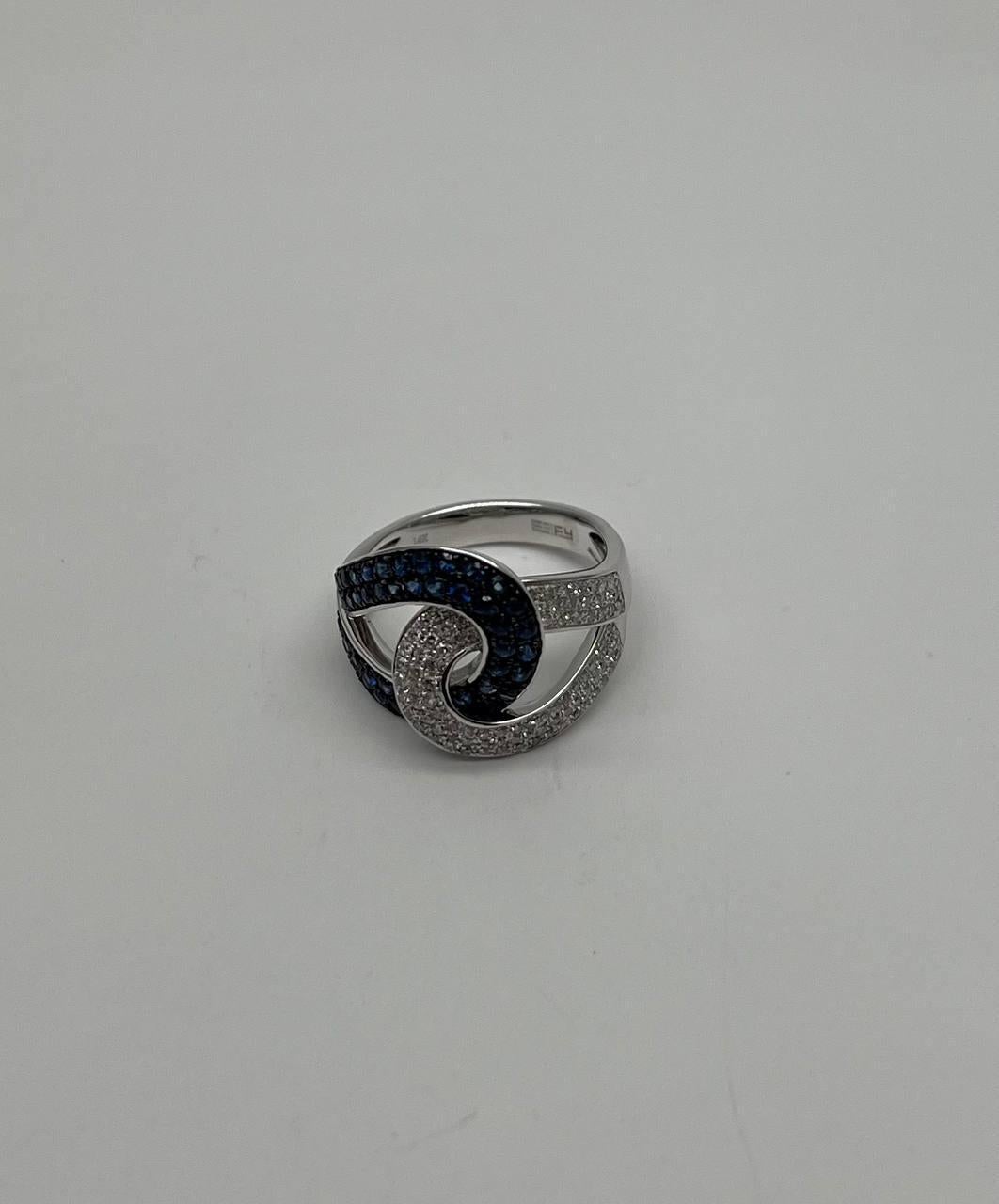 Intertwining Blue Sapphires Diamonds Interlocking Shapes White Gold Fashion Ring For Sale 1