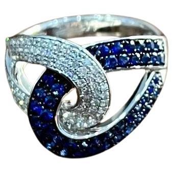 Intertwining Blue Sapphires Diamonds Interlocking Shapes White Gold Fashion Ring For Sale