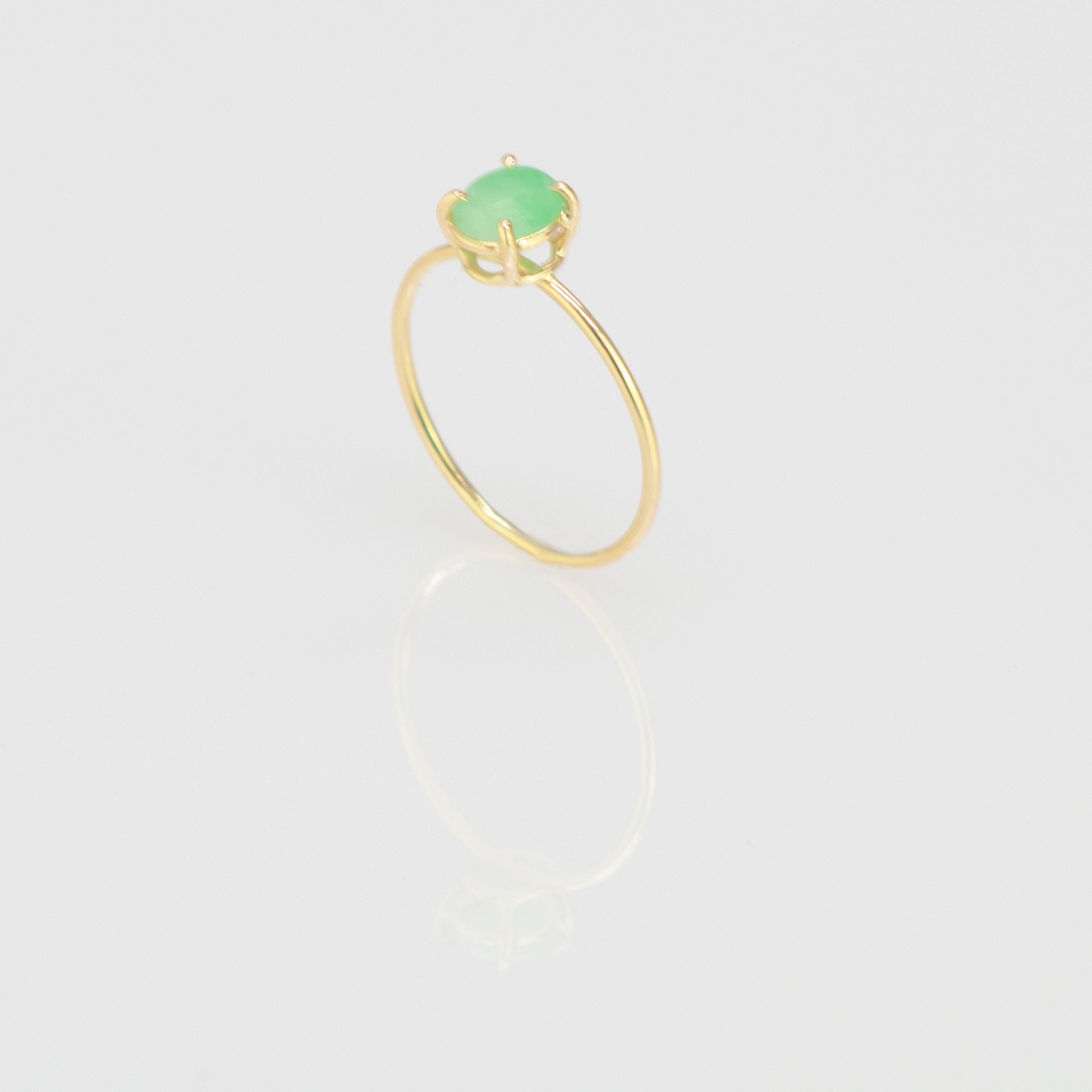 Oval cabochon cut solitaire ring design. 0.7 carats natural jade on 18 karat yellow gold ring inspired by the joy of afternoons with friends. With a perfect size, it will fill with your daily elegant outfits.

This jewellery piece is inspired by its