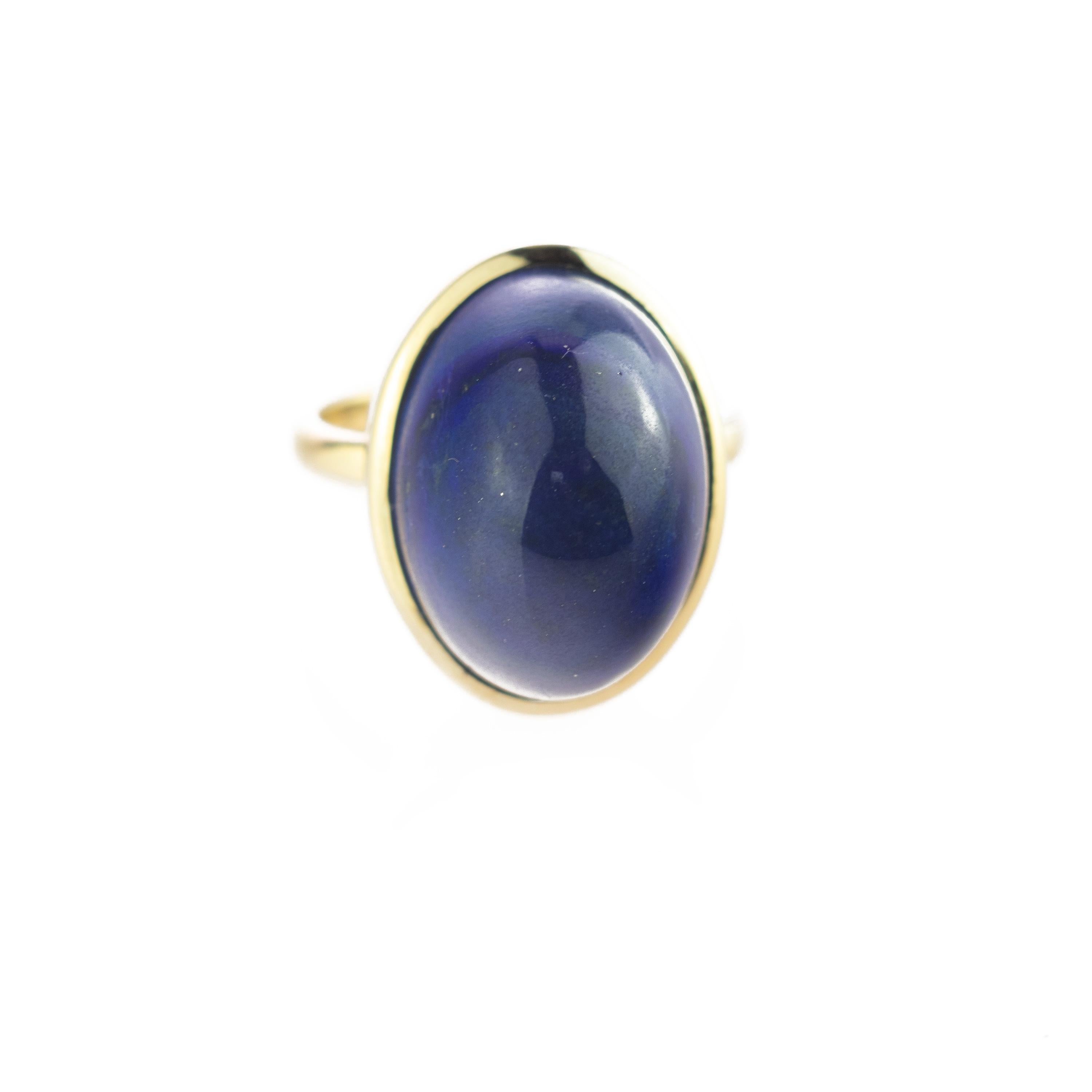 This minimalist design enhances a matte precious natural 26.5 carats Lapis Lazuli cabochon. The 18 karat gold ring highlights the blue color, surrounding into a glamorous and eccentric gold touch.

The Sumerians believed that the spirit of their