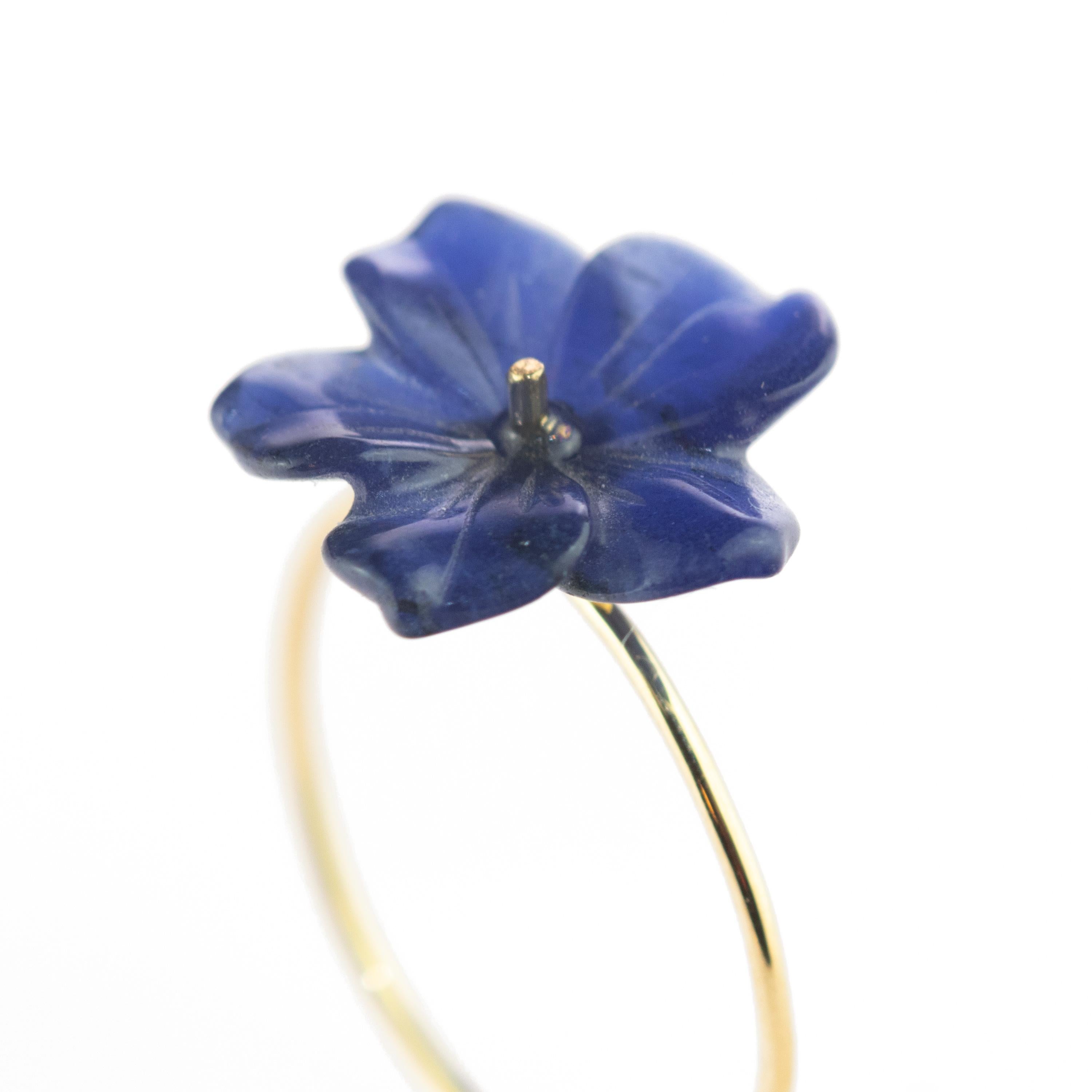 Astonishing handmade  natural Lapis Lazuli flower ring, Carved spring petals that evoke the italian handmade traditional jewelry work. 

Beautiful and delicate design that evokes the roots of beauty that are gradually woven to achieve a harmonious