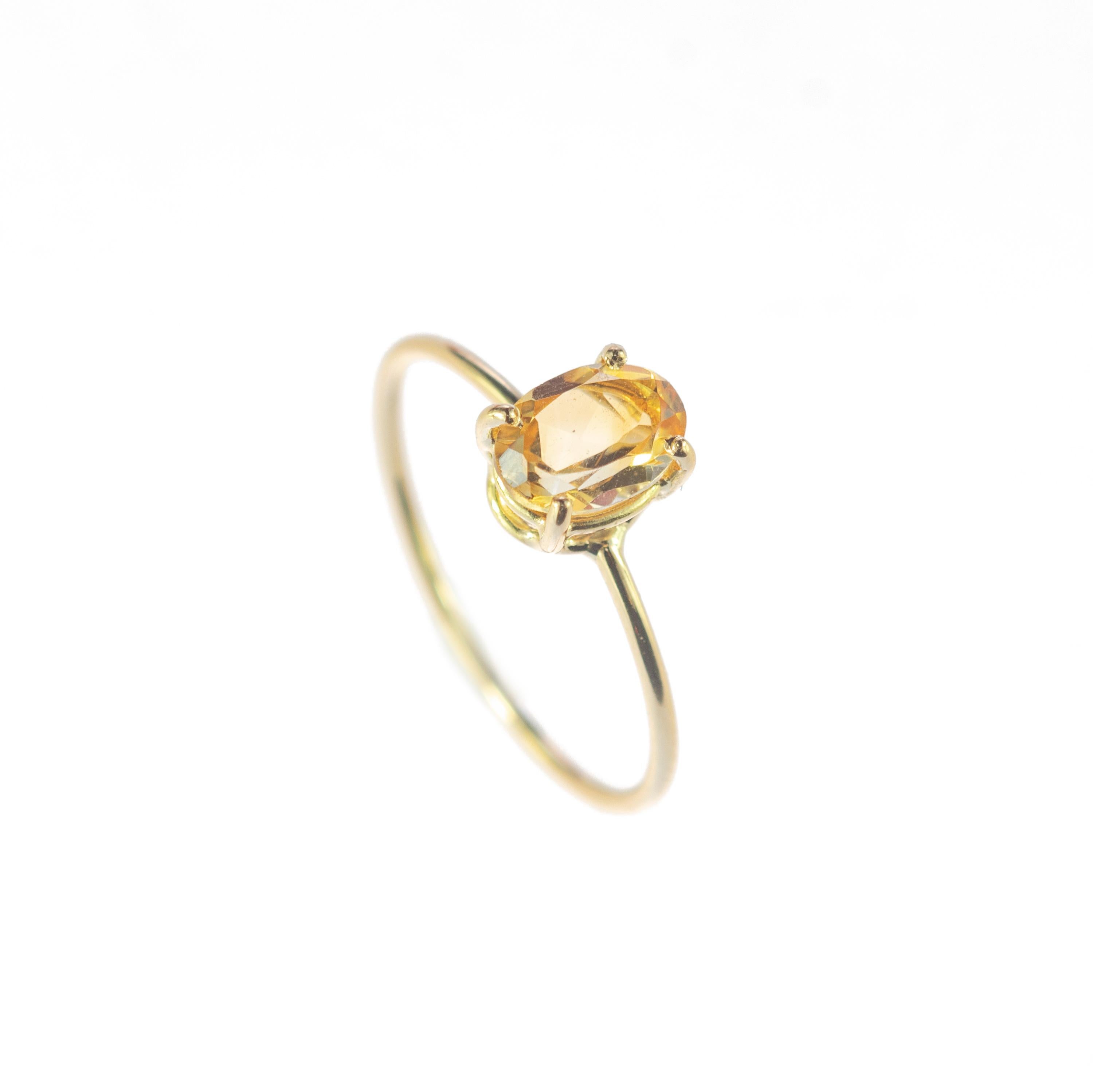 Oval cabochon solitaire ring design, with shining sparkles. 0.7 carat citrine quartz on 18 karat yellow gold ring inspired by the joy of summer sunsets. With a perfect size, it will fill with your daily elegant outfits.
 
This ring is inspired by