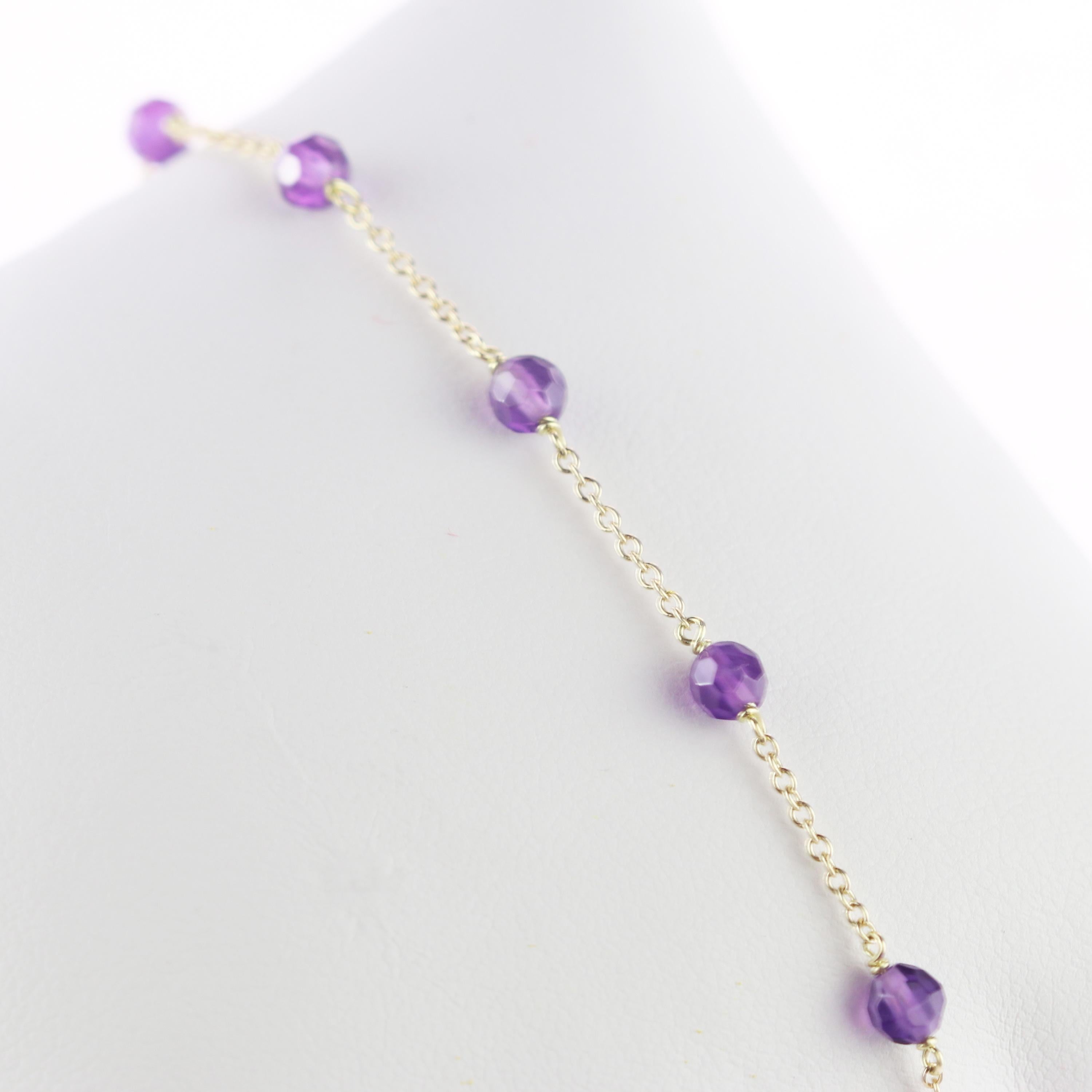 Marvellous bracelet starring natural amethyst beads, for a bright charm of uniqueness. Luminous jewel with natural precious jewellery on elegant 9 karat yellow gold setting.

Amethyst is marked as the stone for the month of February. Amethyst is the